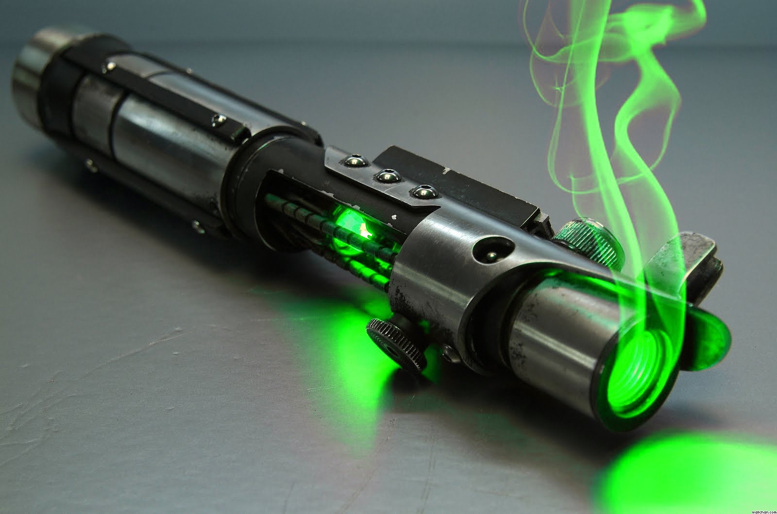 Green lightsaber with smoke HD Wallpaper