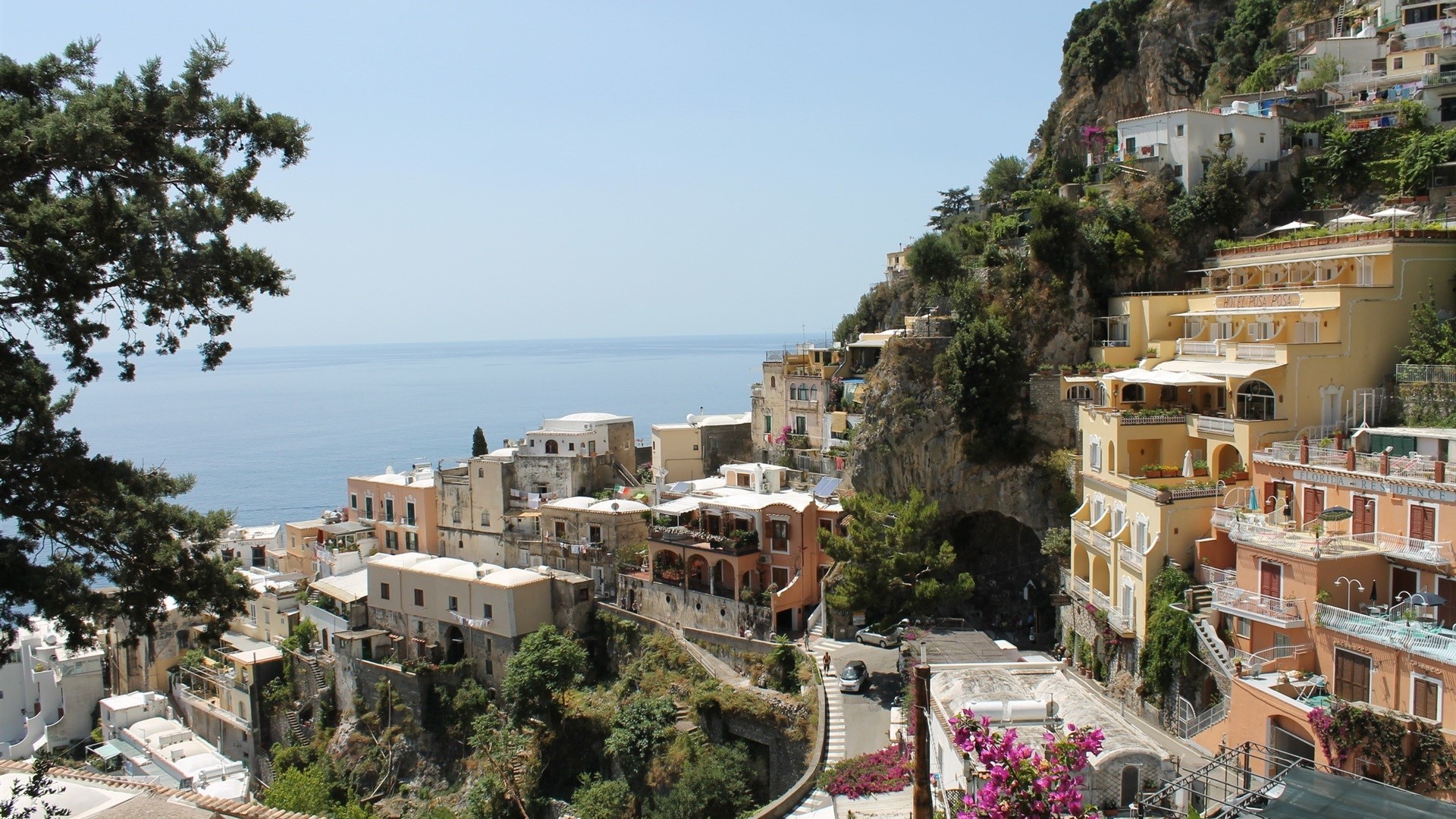 Positano, Italy: Cliffside buildings overlooking the sea HD Wallpaper