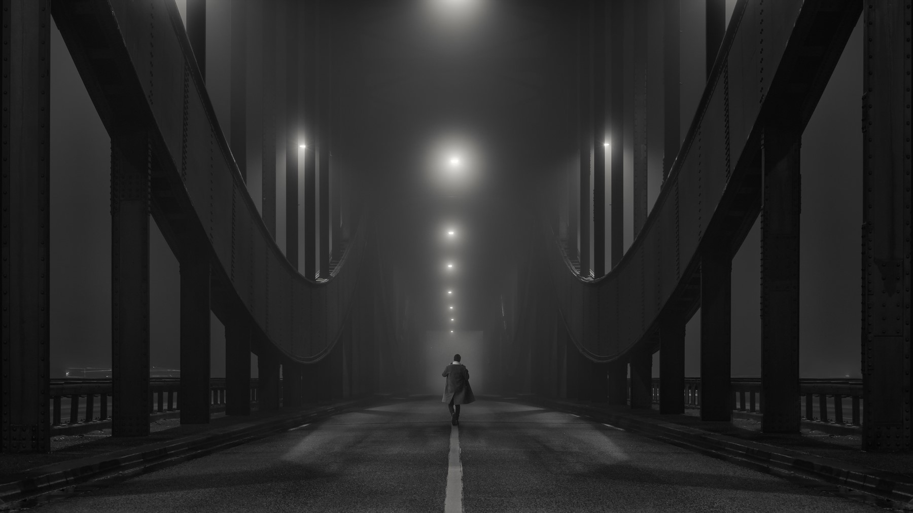 Man walking on a foggy bridge in Hamburg at night HD Wallpaper