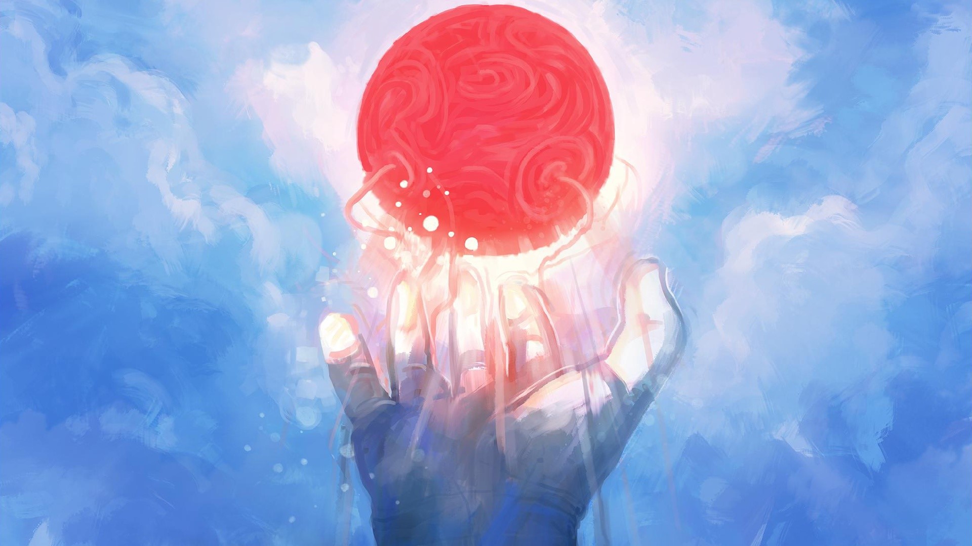 Hands holding a glowing red orb against a blue sky HD Wallpaper