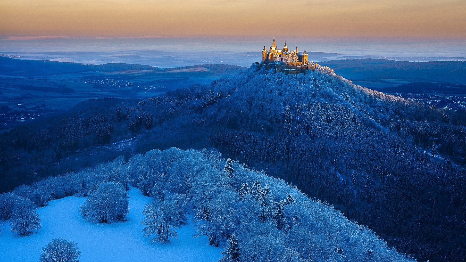 Burg Hohenzollern castle on a snowy mountain in Germany HD Wallpaper