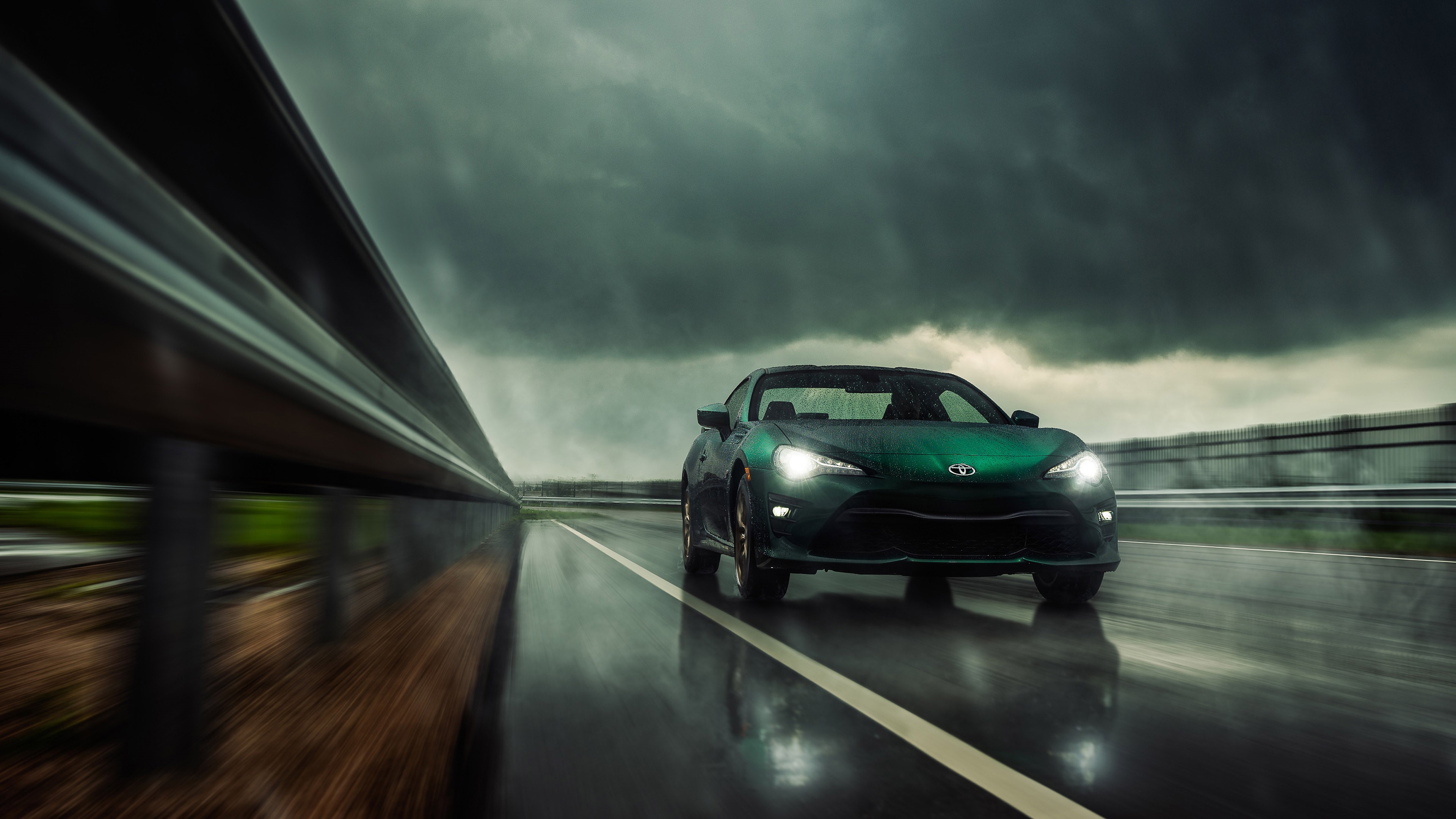 4K Toyota GT86 driving on a wet road HD Wallpaper