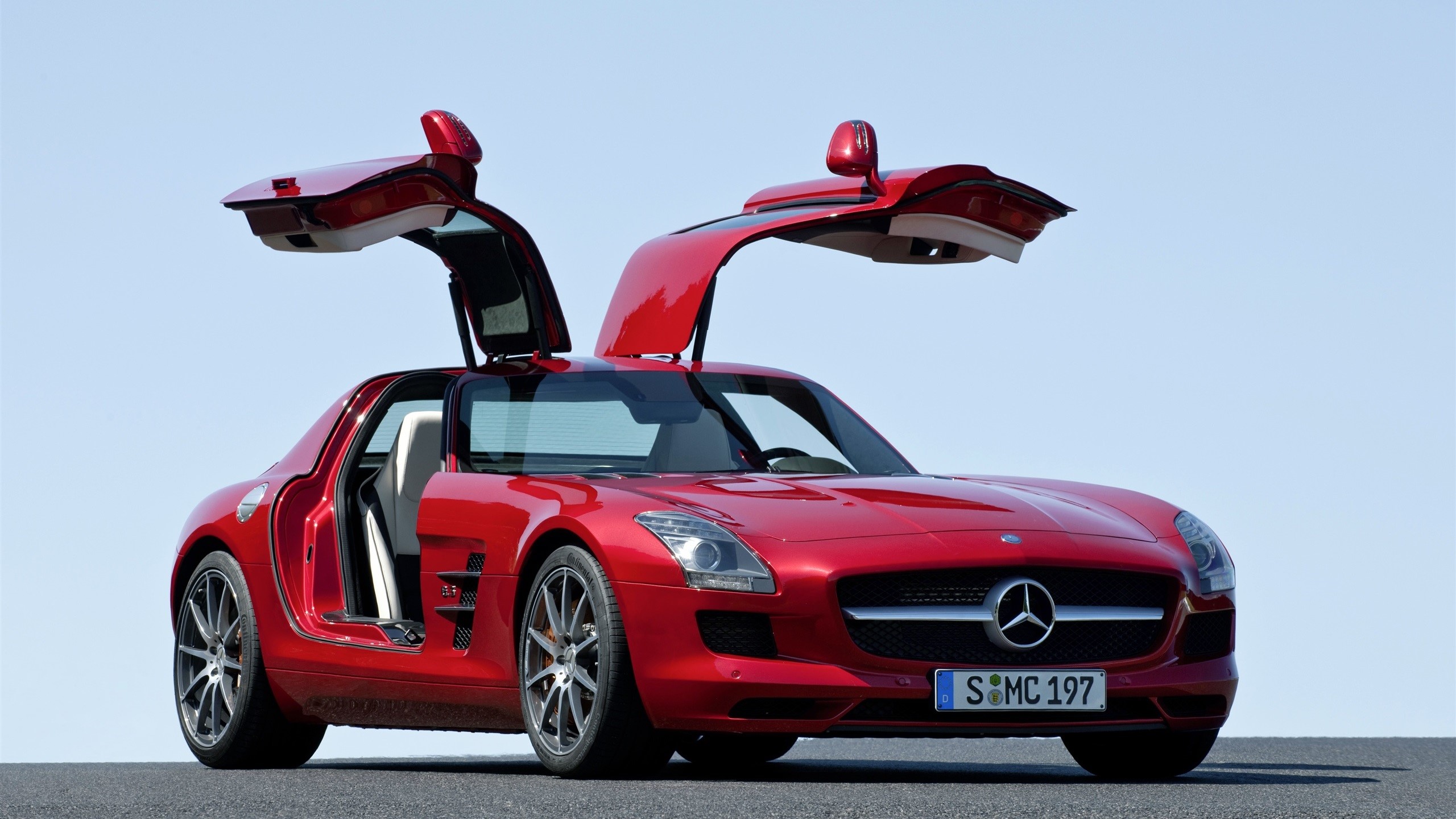 Red Mercedes-Benz SLS AMG with Gullwing Doors Open HD Wallpaper