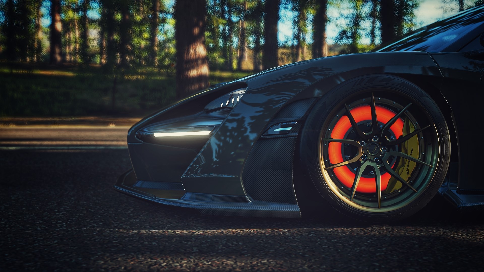 McLaren Senna with glowing brakes on a road HD Wallpaper