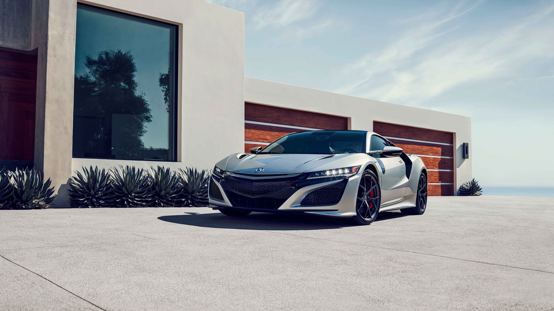 Silver Acura NSX sports car parked in front of a modern house HD Wallpaper