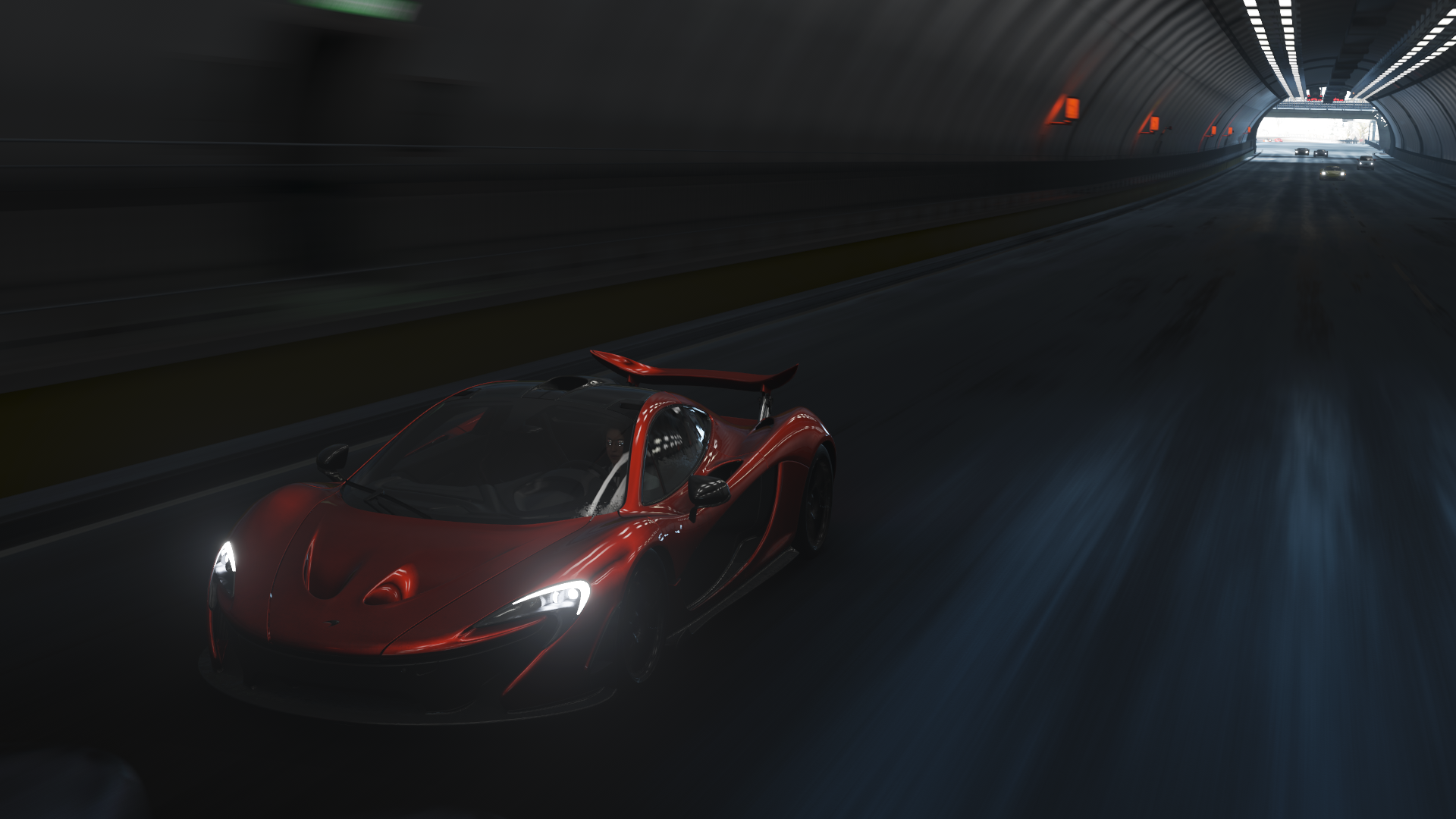 Red McLaren P1 driving through a tunnel in Forza Horizon 4 HD Wallpaper