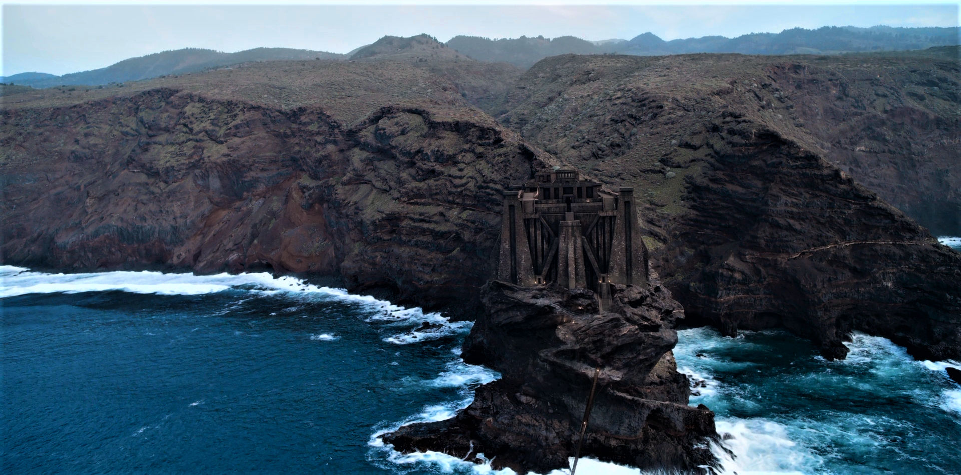 Castle on a rocky island in the sea HD Wallpaper