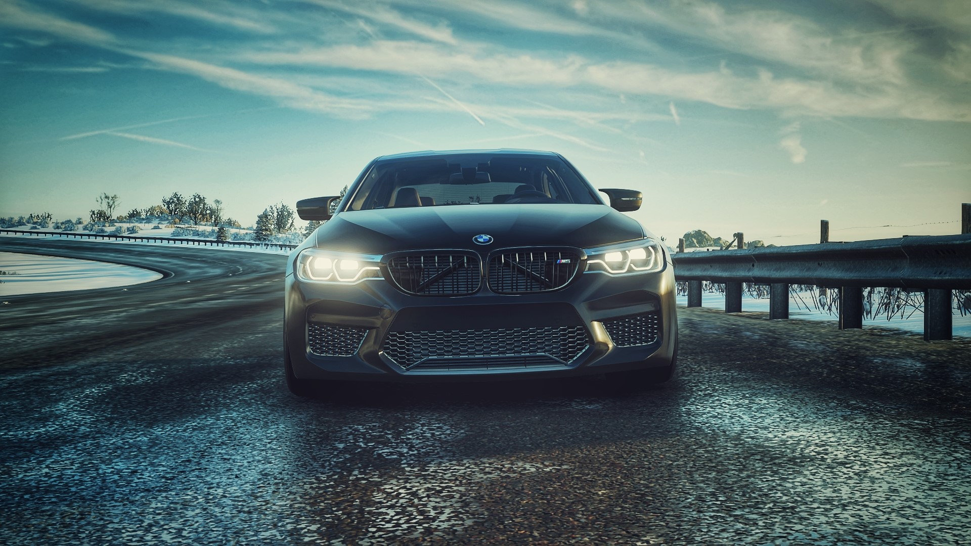Black BMW M5 F90 on a Winding Road HD Wallpaper