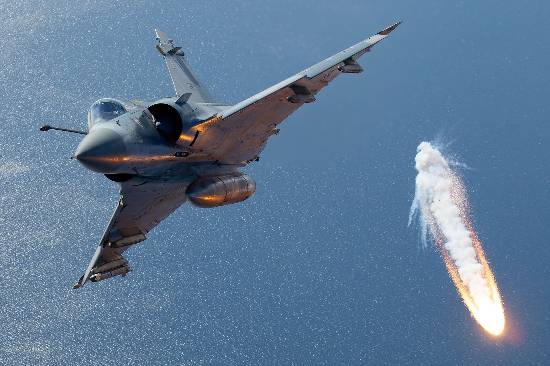 Mirage 2000 fighter jet fires a flare HD Wallpaper