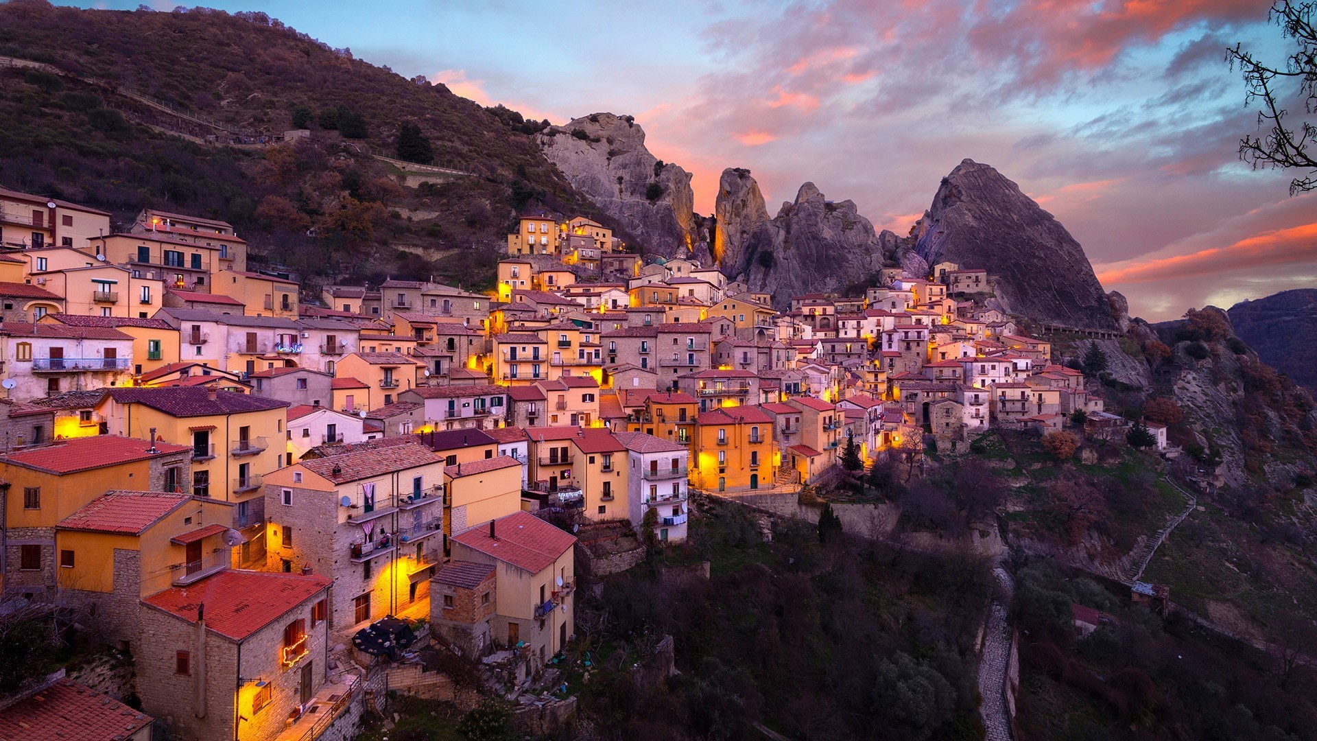 Castelmezzano village at sunset with rocky mountains, Italy HD Wallpaper