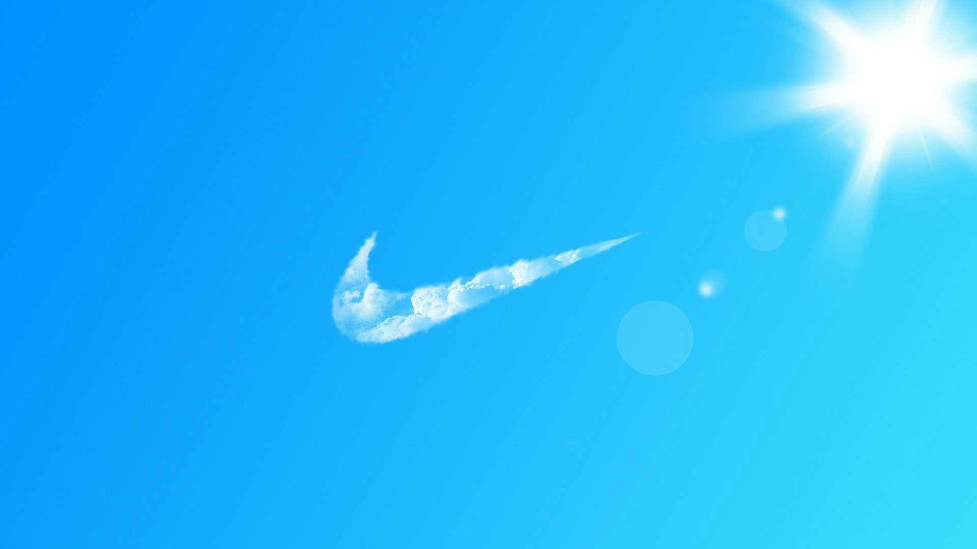 Nike logo made of clouds in the sky HD Wallpaper