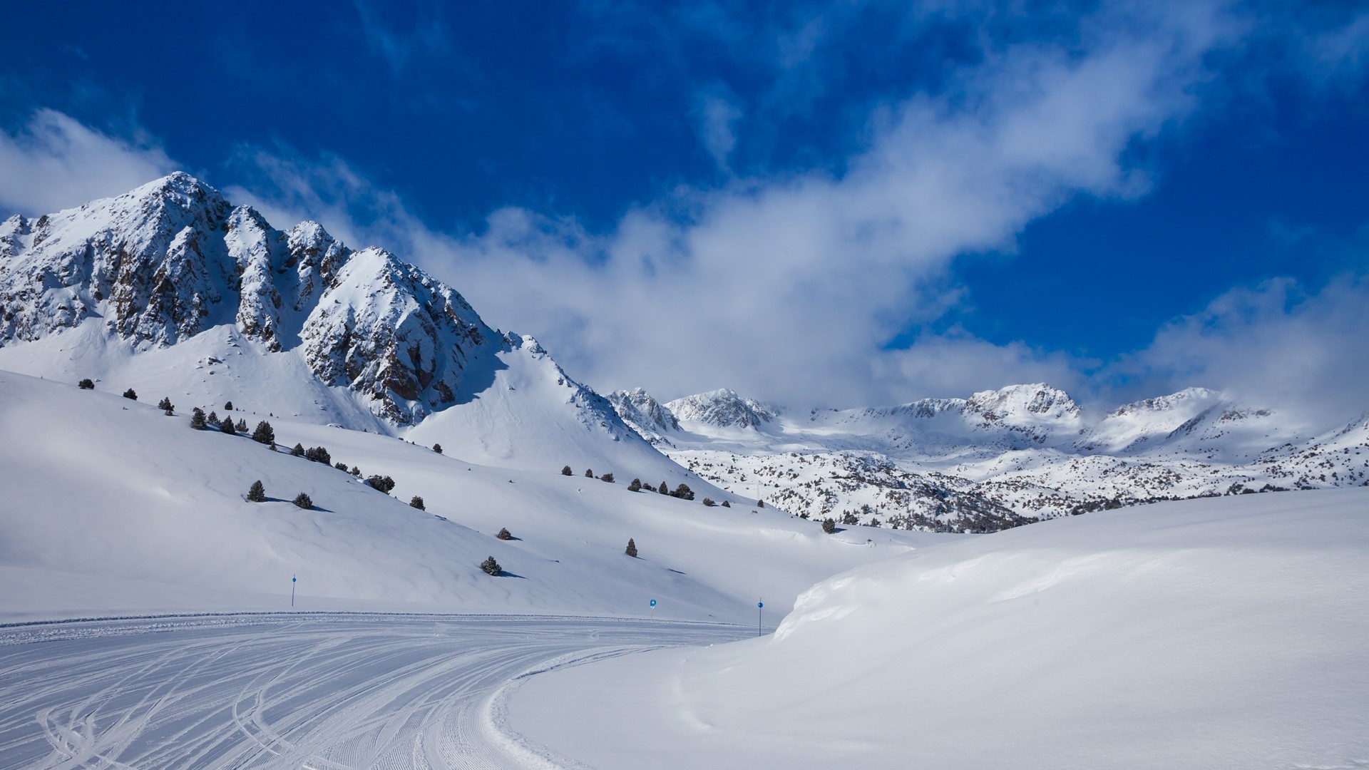 Snowy mountains and ski path in Andorra HD Wallpaper