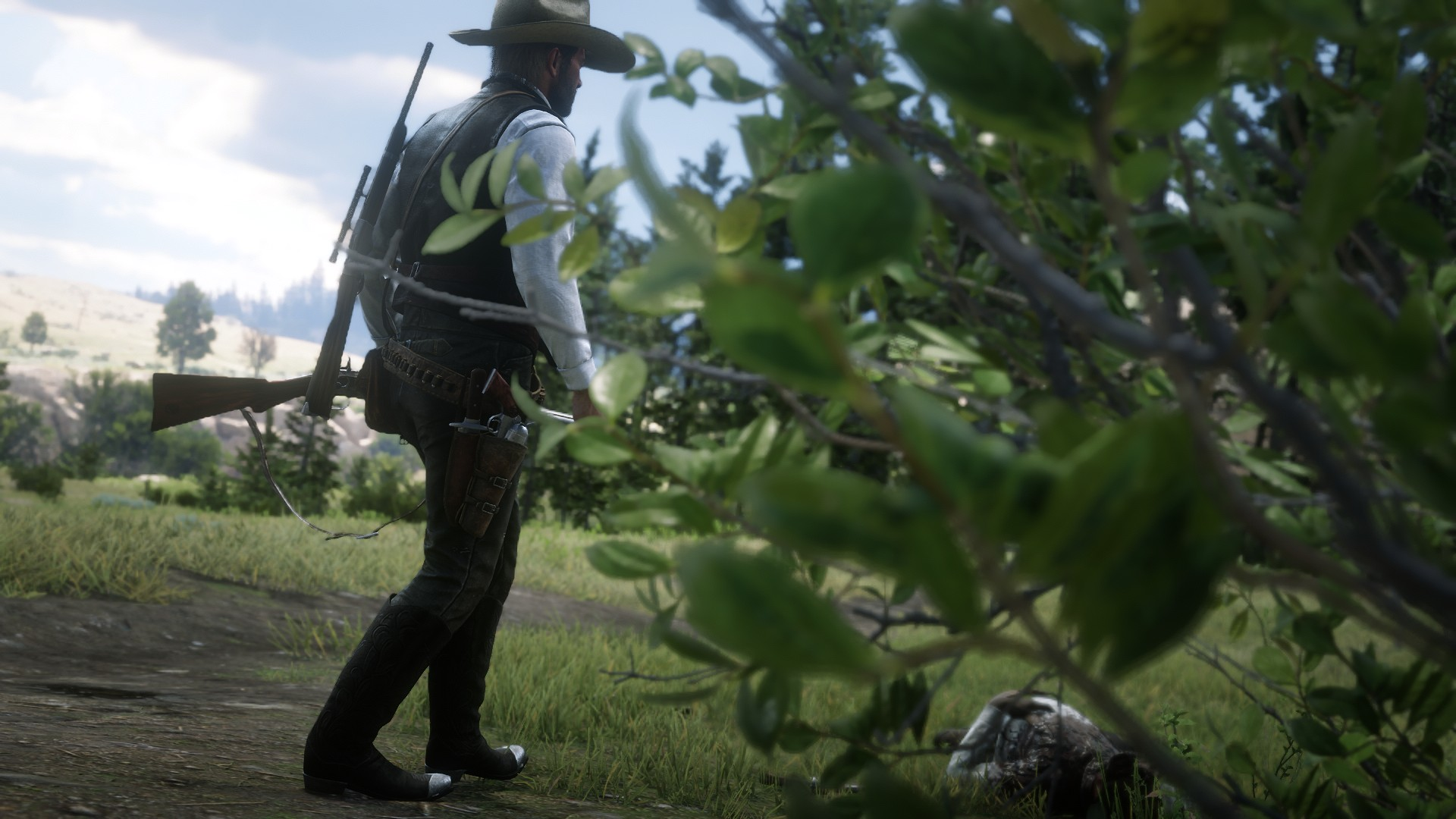 Man with rifle and pistol in Red Dead Redemption 2 HD Wallpaper