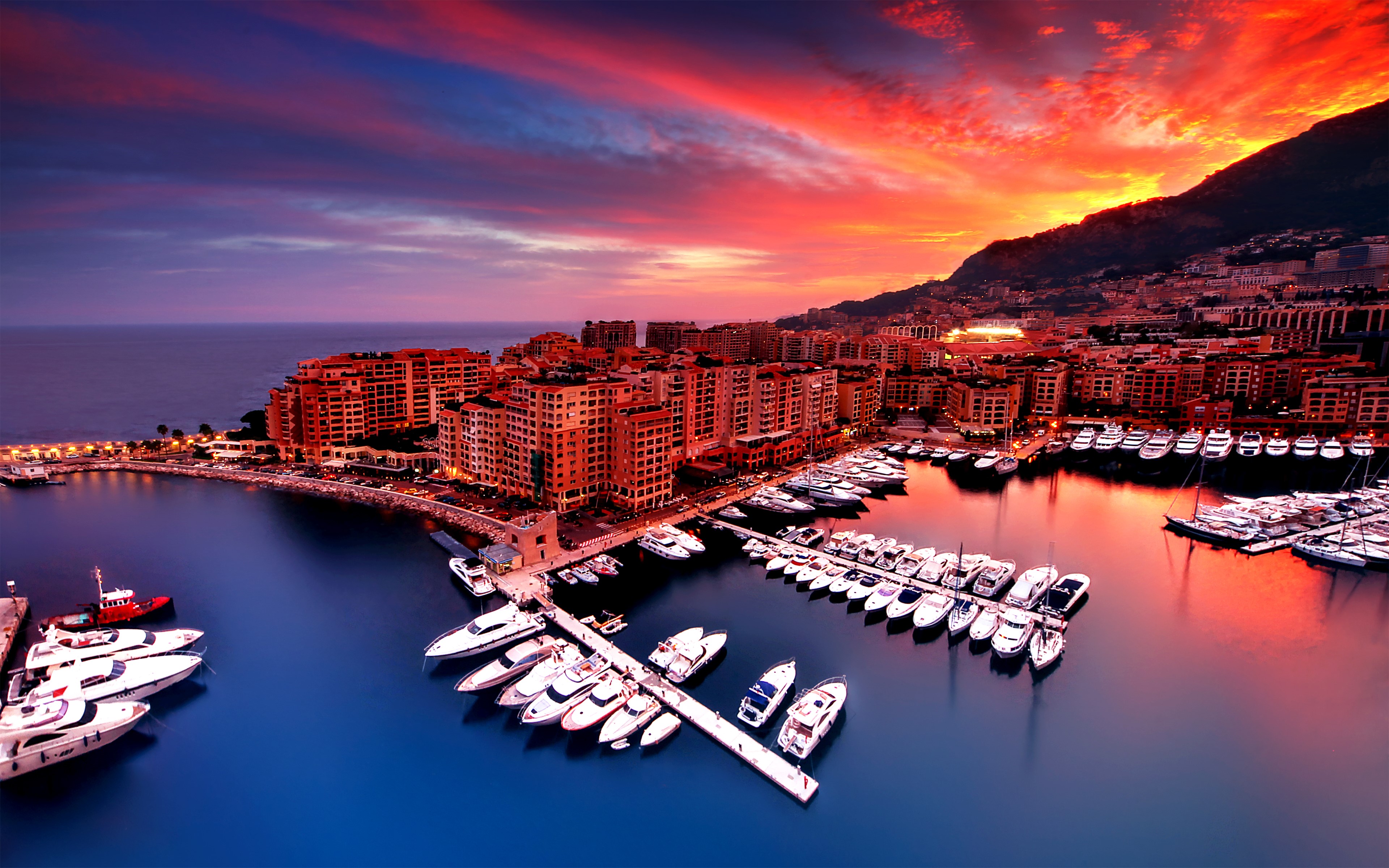 Monaco cityscape at sunset with harbor and yachts HD Wallpaper
