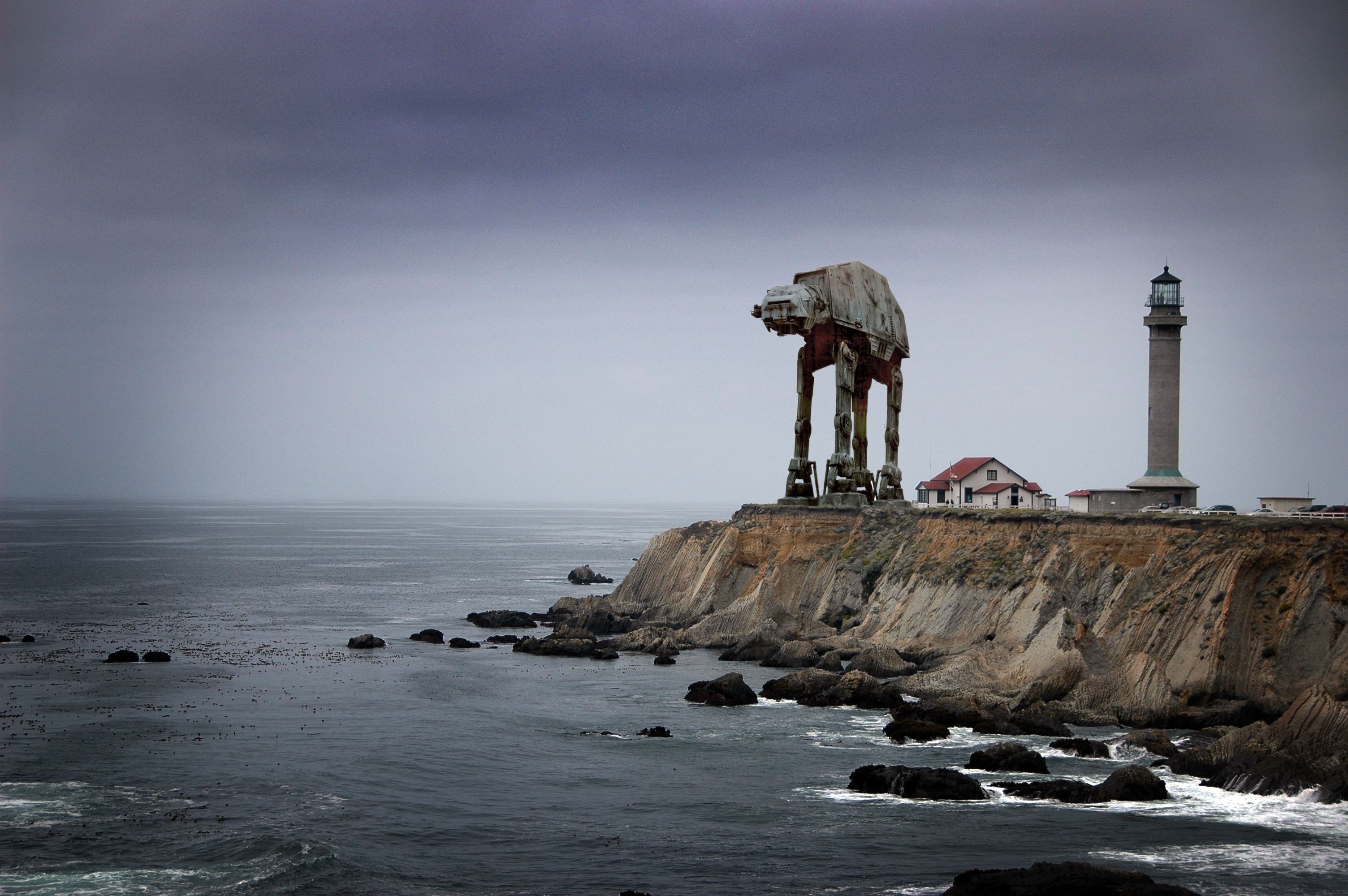 AT-AT Walker and Lighthouse on a Cliff by the Sea HD Wallpaper