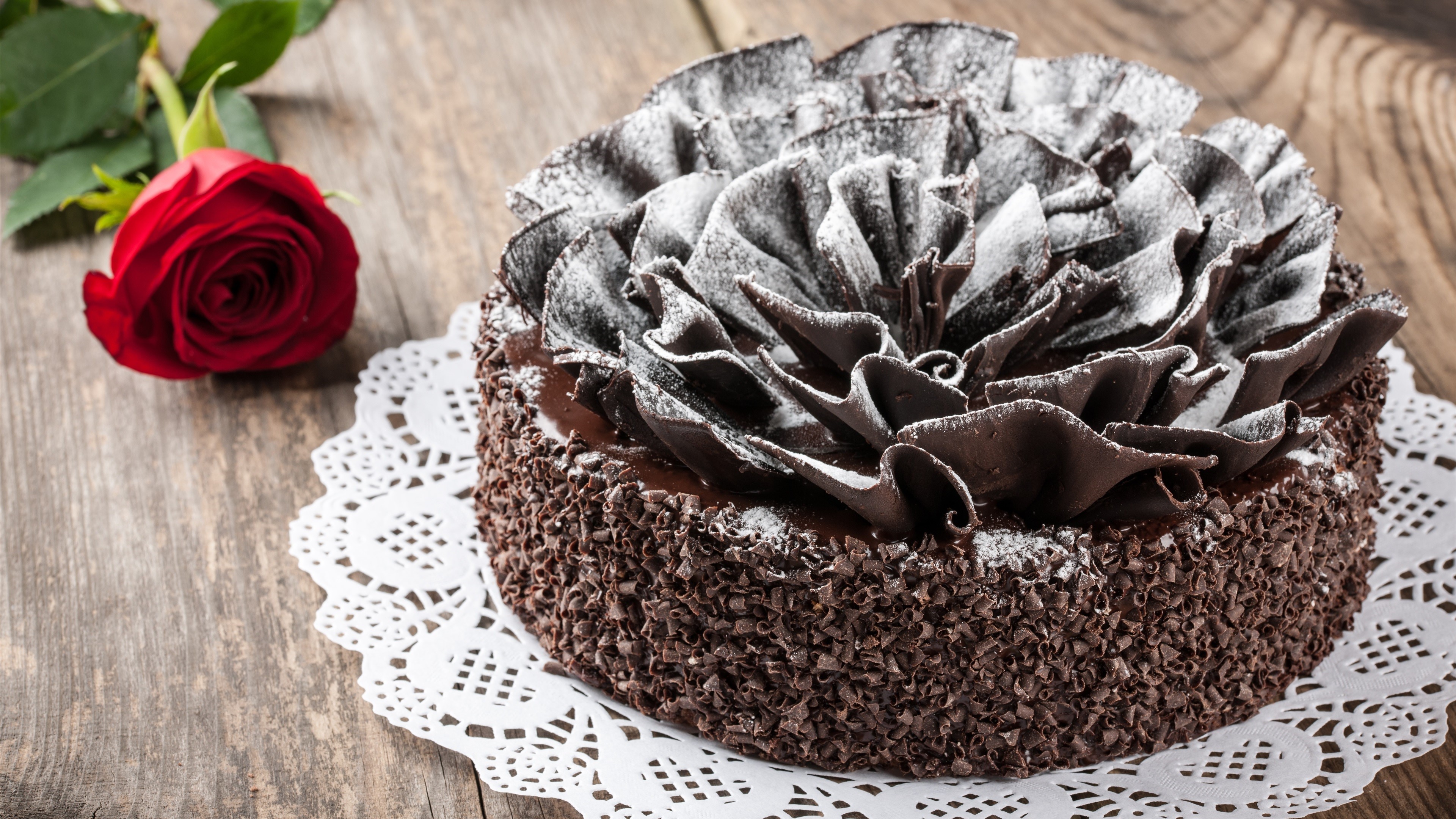 Chocolate cake with chocolate shavings and a red rose HD Wallpaper
