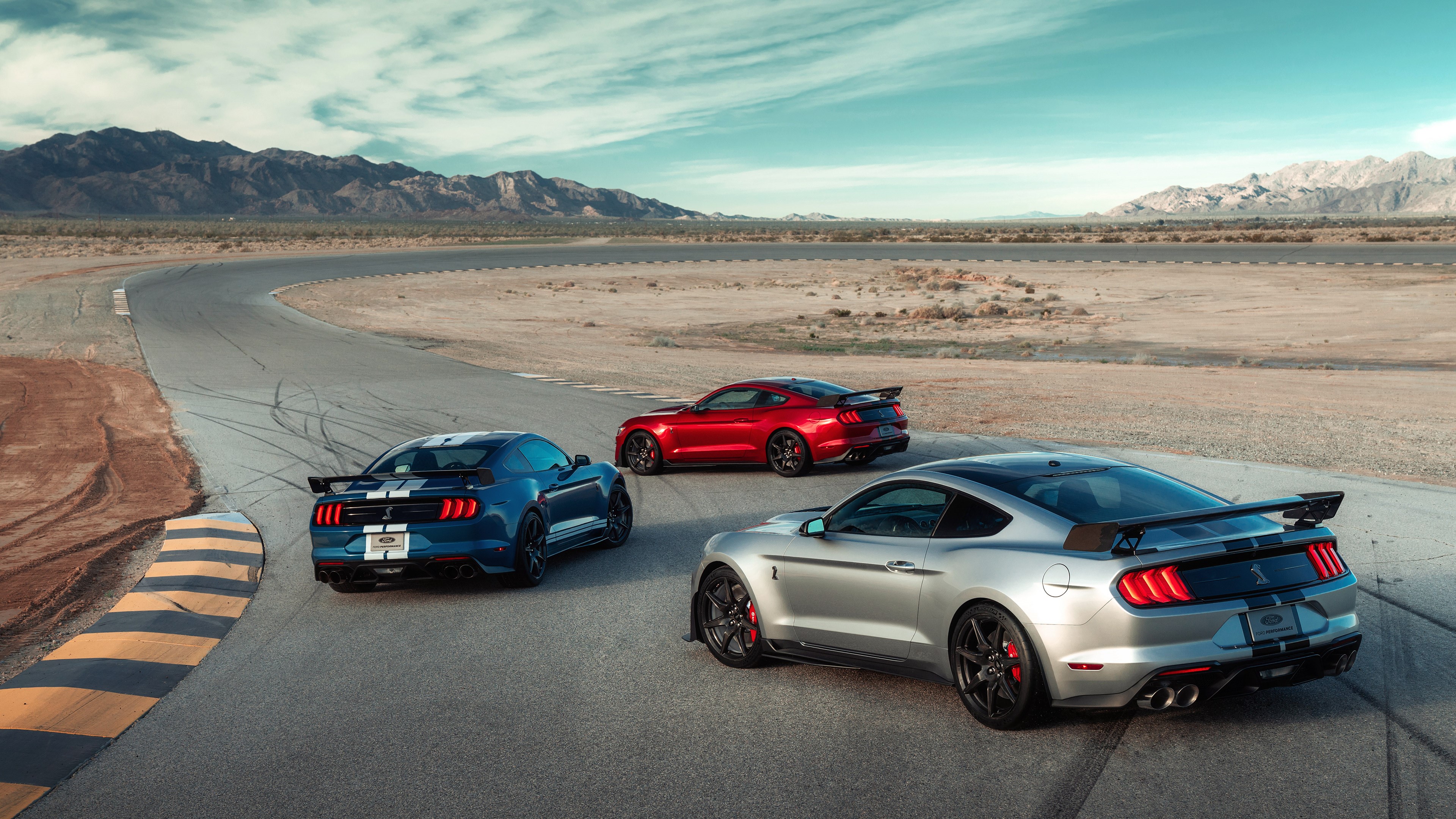 Ford Mustang Shelby GT500 cars on a race track HD Wallpaper