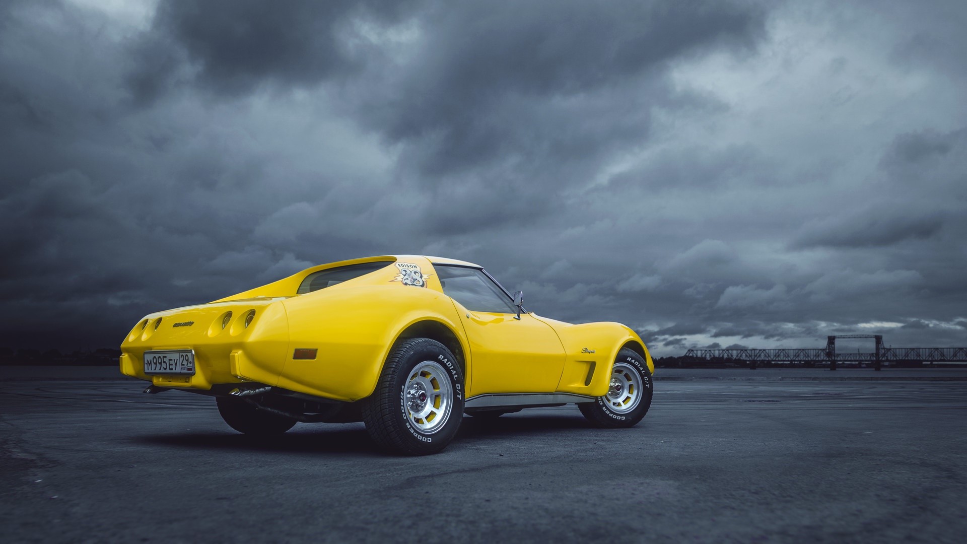 Yellow Chevrolet Corvette C3 on a cloudy day HD Wallpaper
