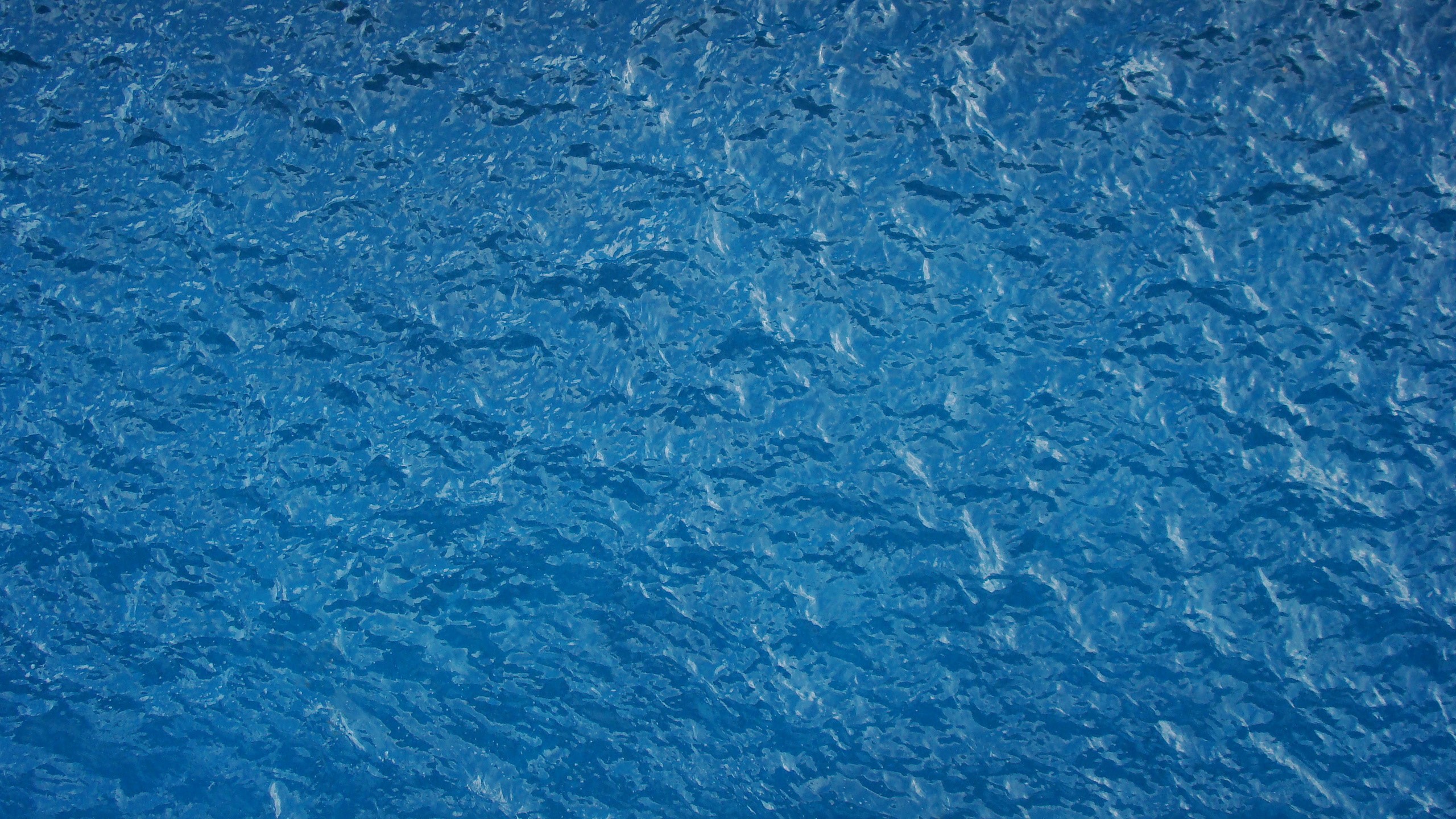 Blue water surface with ripples HD Wallpaper