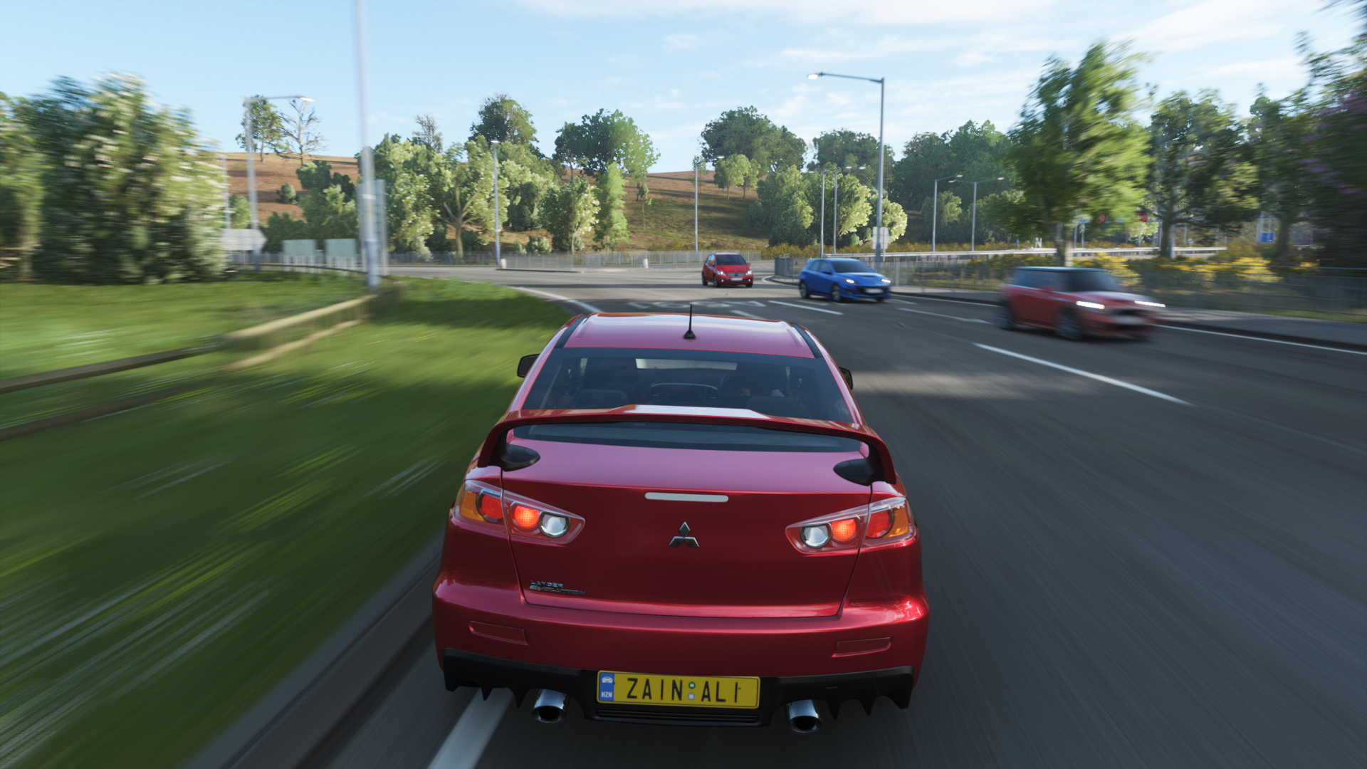 Red Mitsubishi Lancer Evolution X driving on a road HD Wallpaper