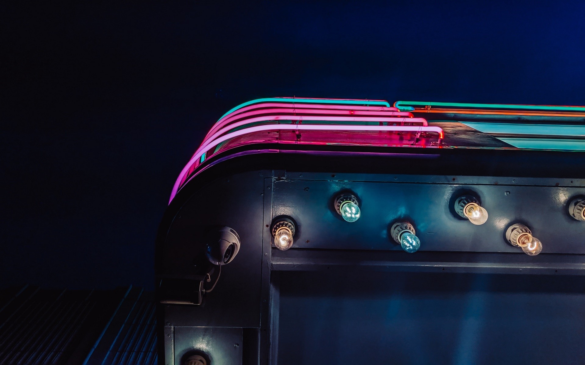 Neon lights and lightbulbs on a dark background HD Wallpaper