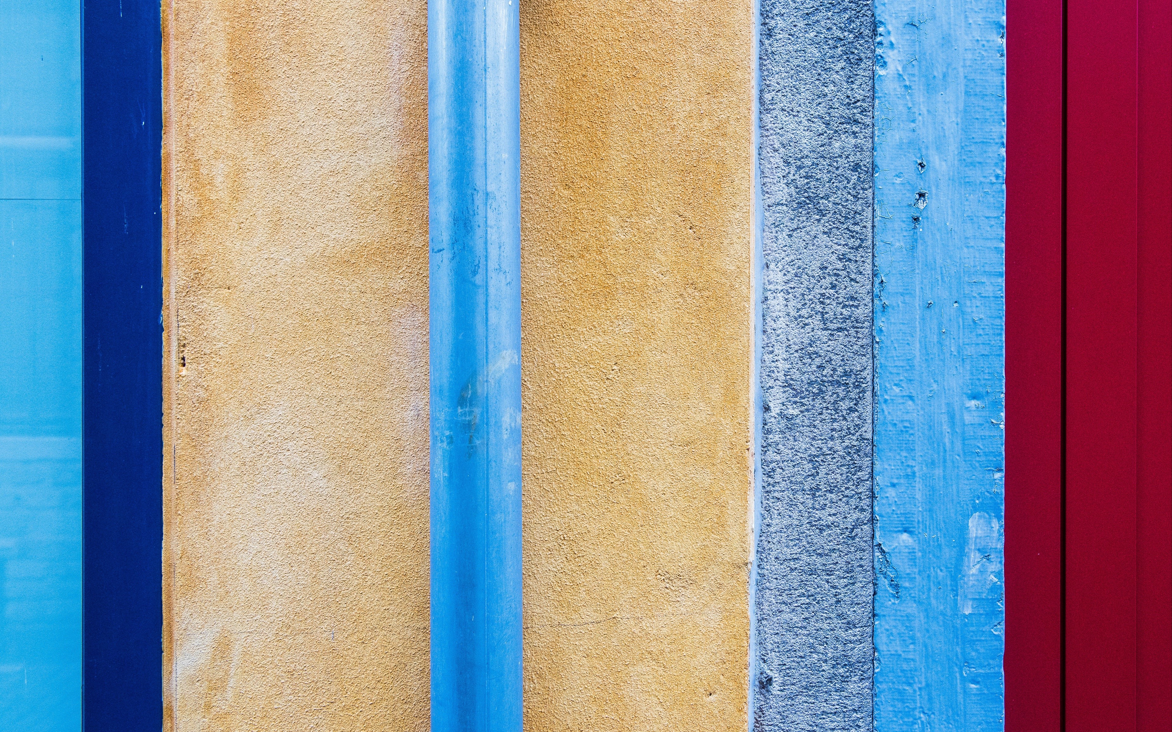 Colorful textured wall with blue pipe HD Wallpaper