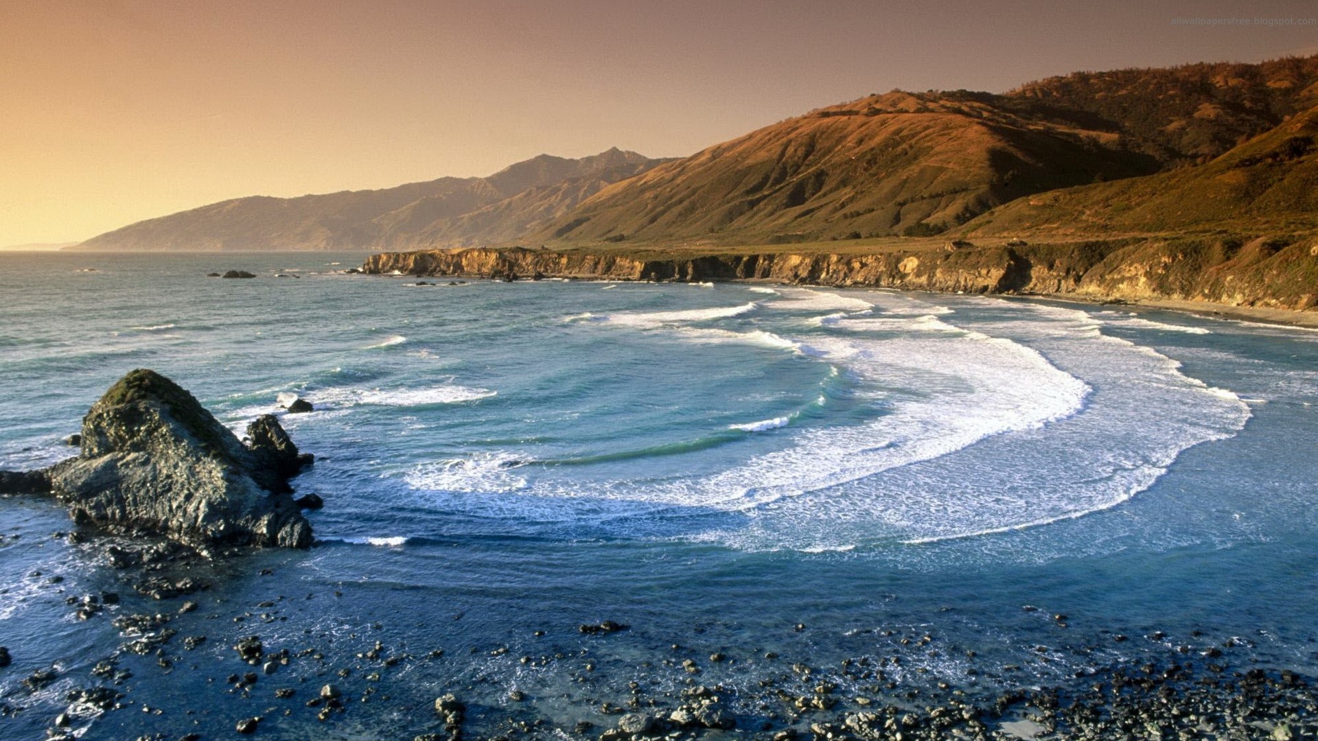Coastal mountains and ocean waves at sunset HD Wallpaper