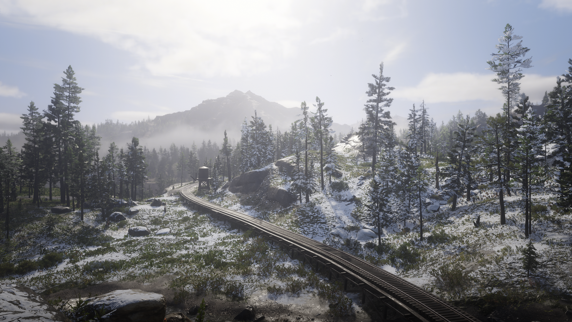 Red Dead Redemption 2 screenshot of a snowy landscape with train tracks HD Wallpaper