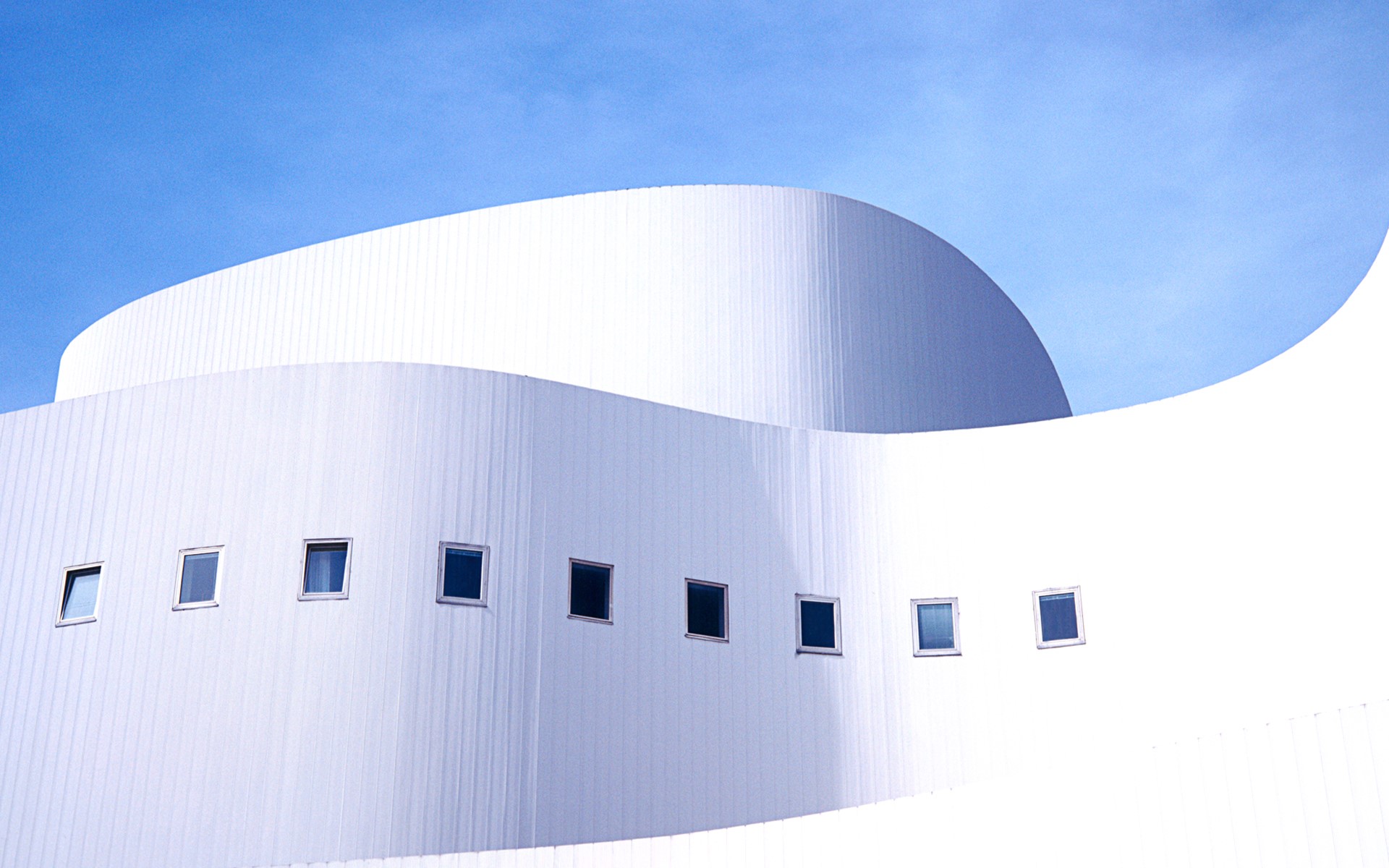 Modern white building with blue sky HD Wallpaper