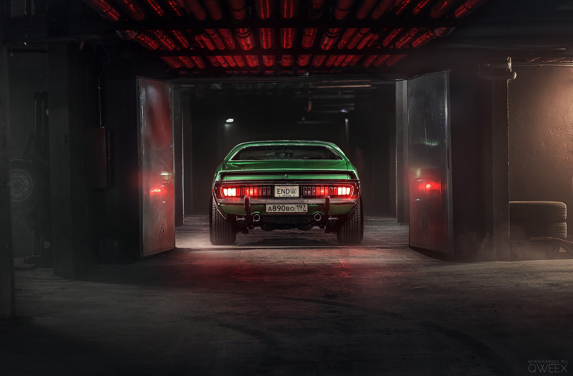 Green Dodge Charger parked in a garage HD Wallpaper