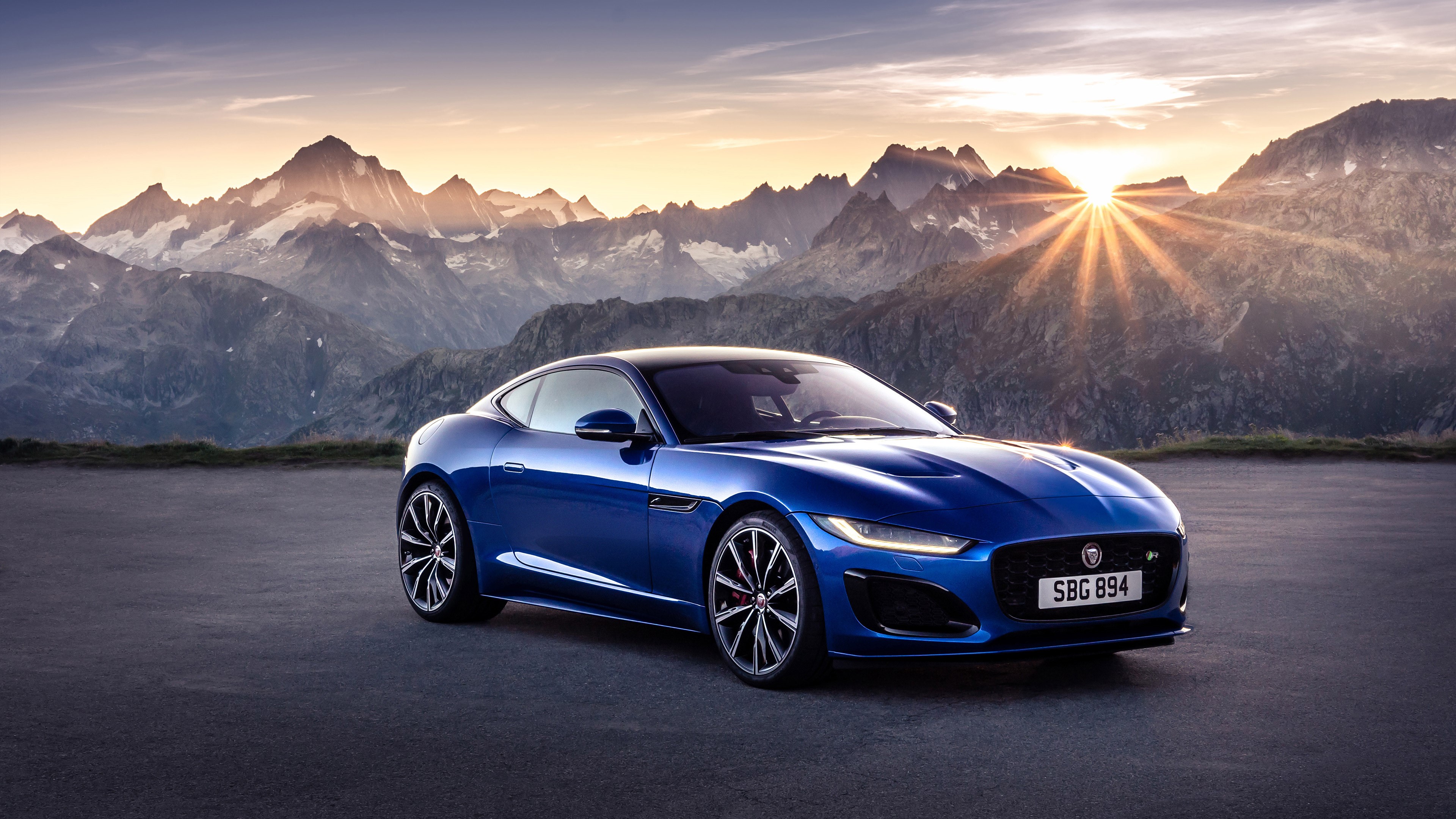 Blue Jaguar F-Type Coupe in Mountains at Sunset HD Wallpaper