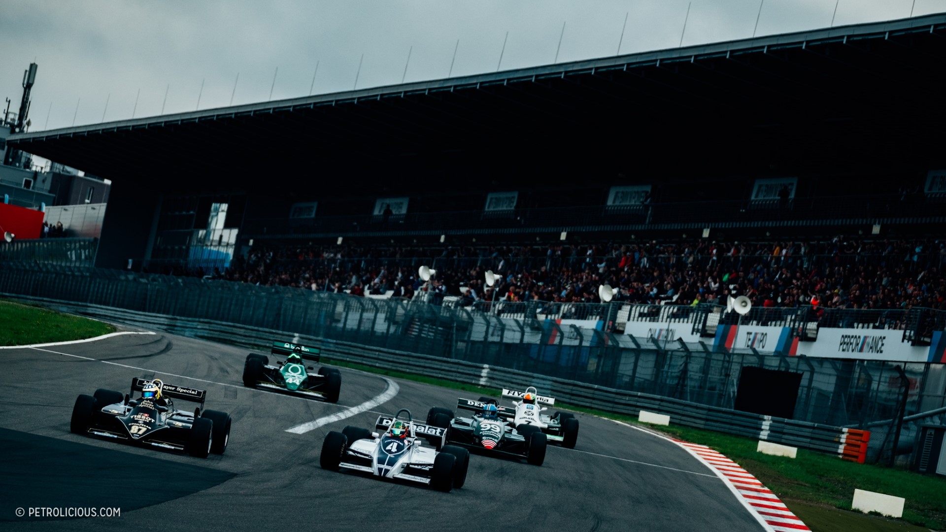 Formula 1 Race Cars Competing on Track HD Wallpaper