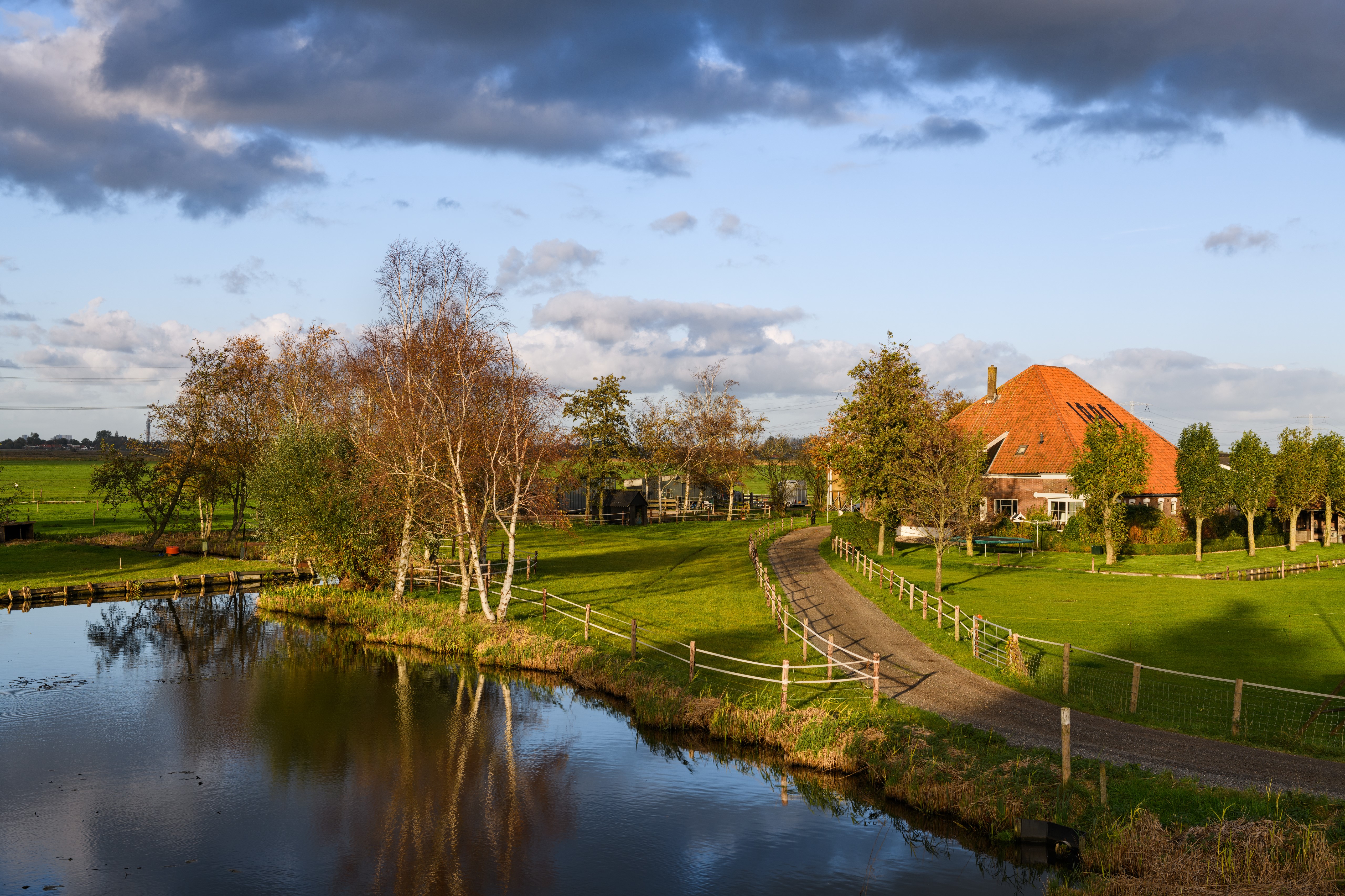 Farmhouse with pond in the Netherlands during fall HD Wallpaper
