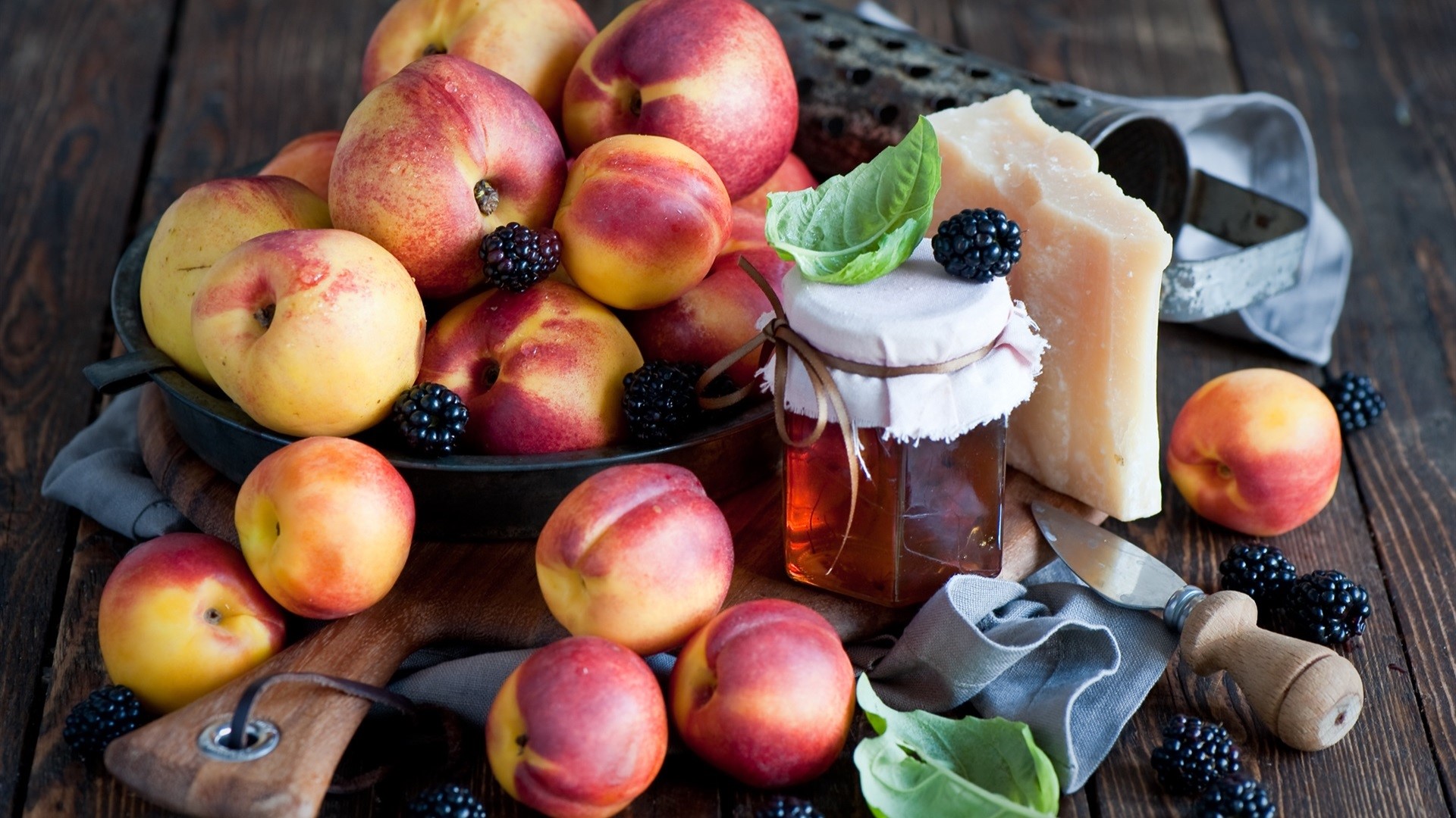 Peaches, blackberries, cheese, and jam on a wooden table HD Wallpaper