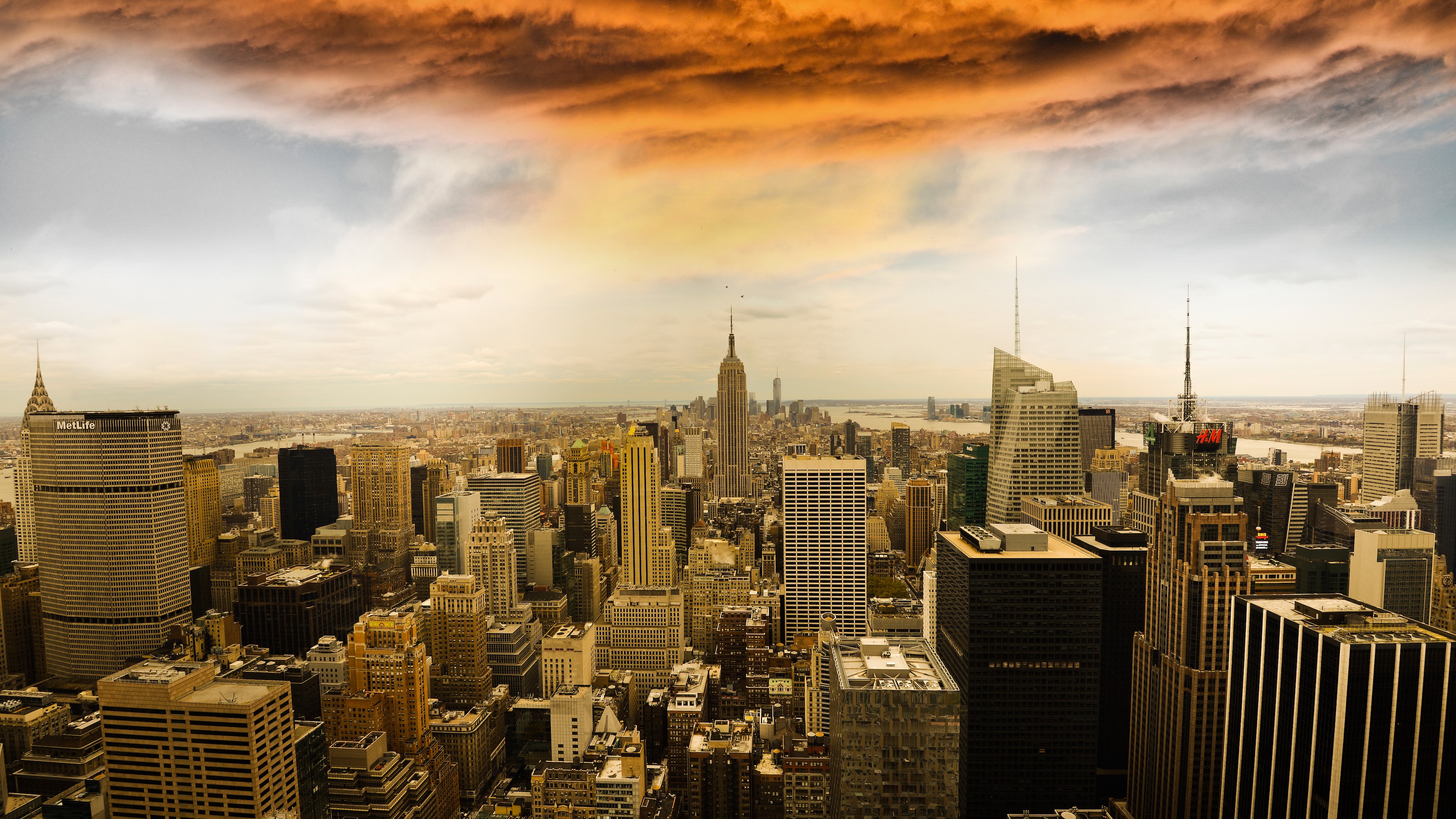 New York City Skyline with Empire State Building and Clouds HD Wallpaper