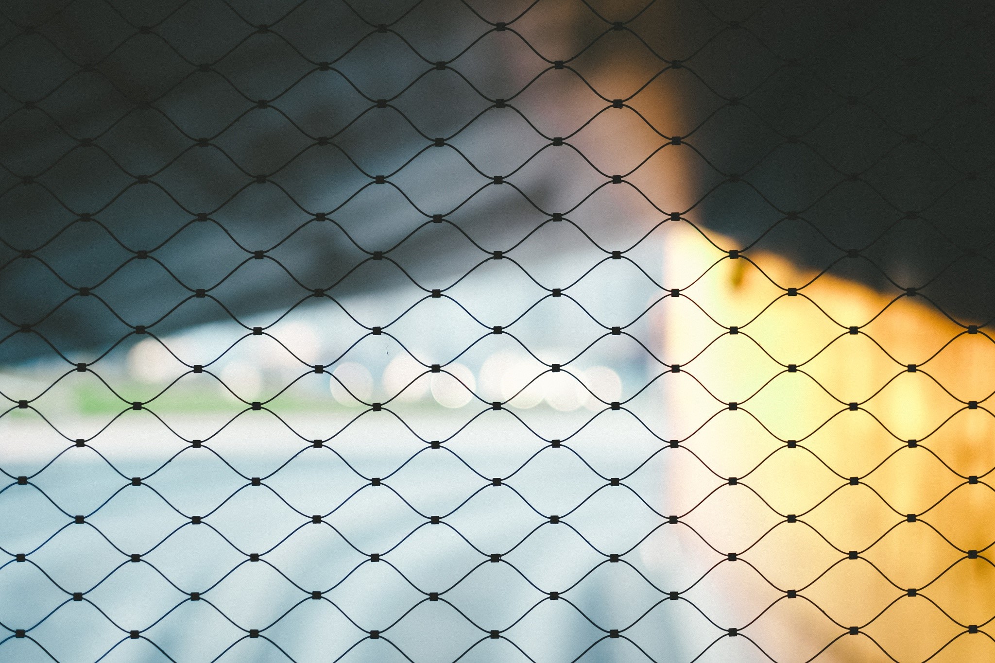 Sunlight on a fence HD Wallpaper