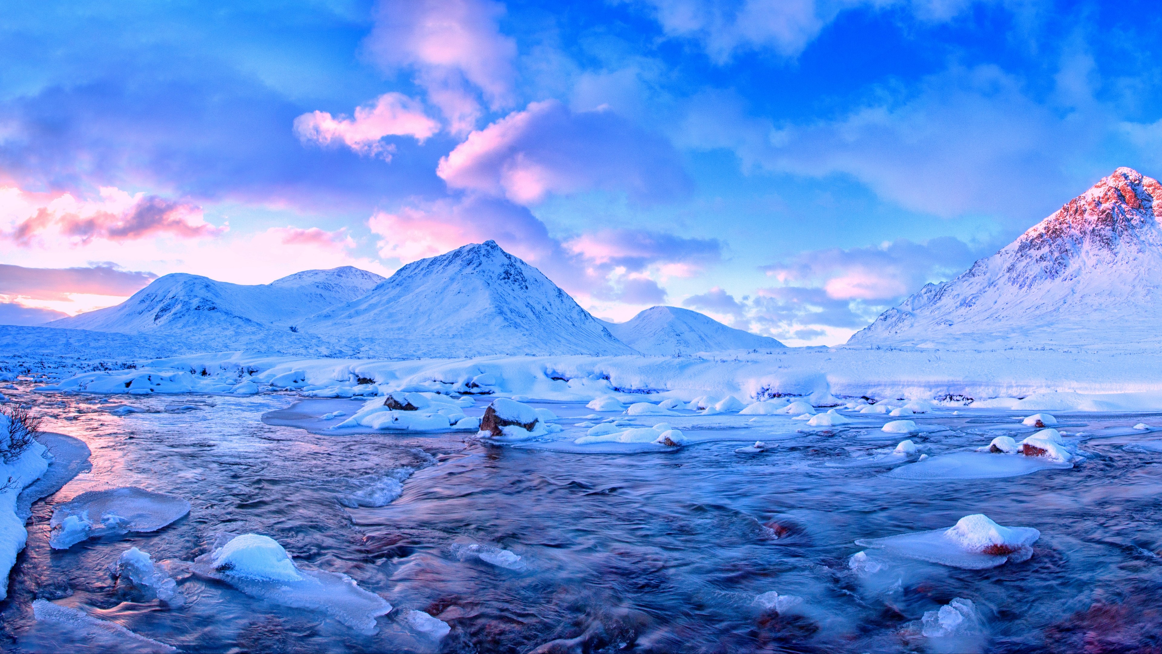 Snowy mountains and river at sunset HD Wallpaper