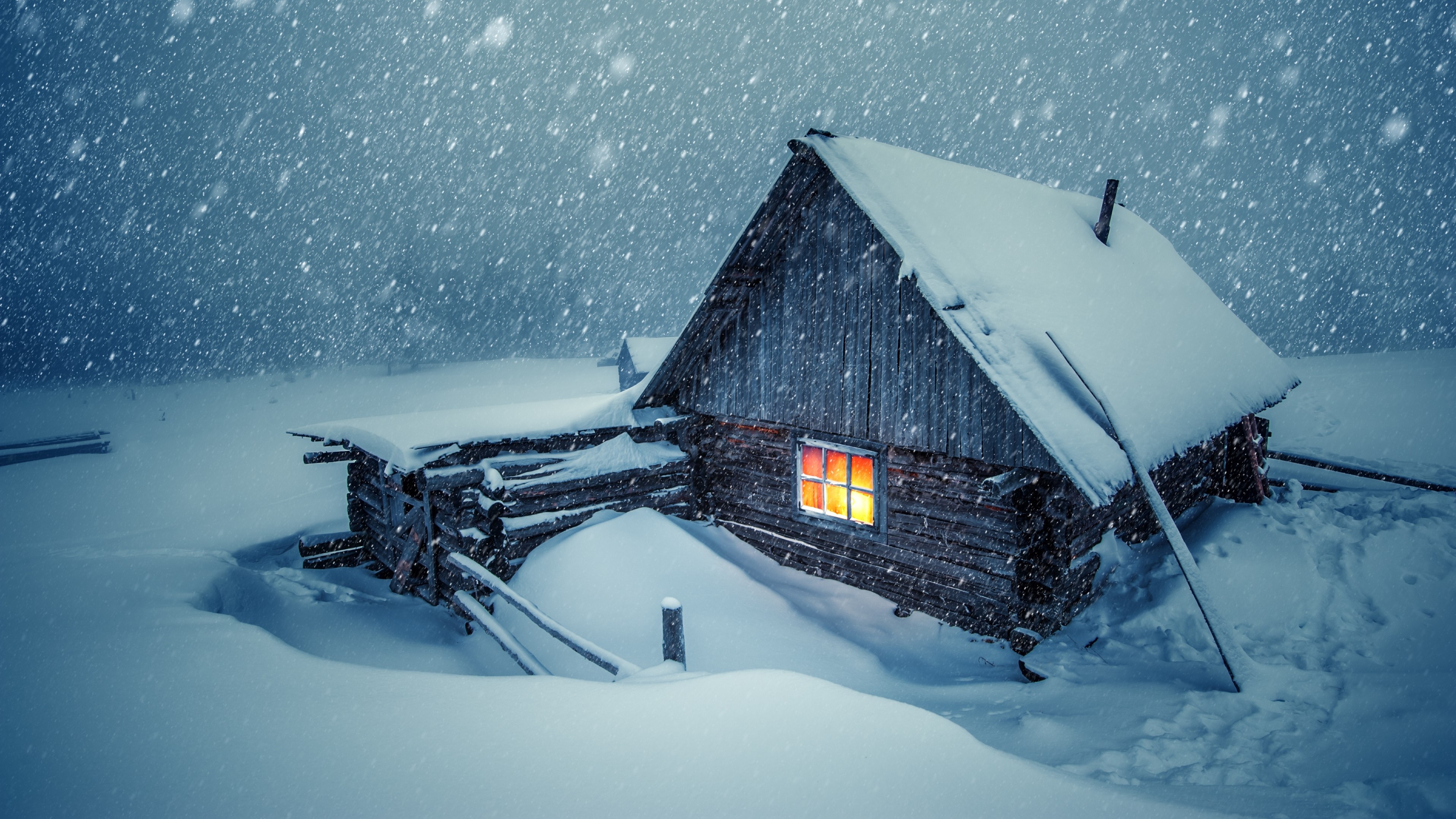 Cozy Snowing Cabin with Warm Lights Evening HD Wallpaper