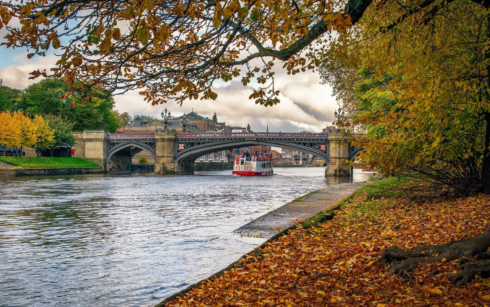 Bridge over river in York during fall HD Wallpaper