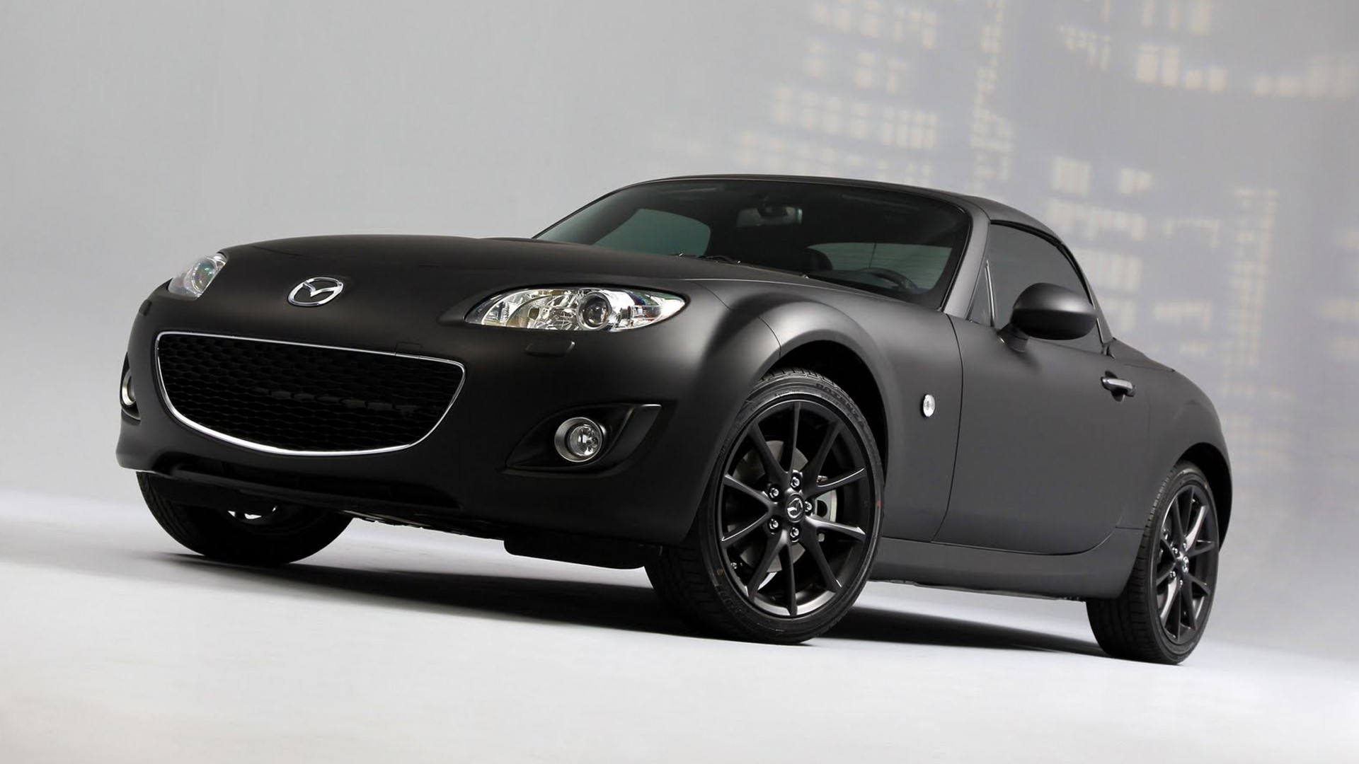 Matte black Mazda MX-5 front angle view HD Wallpaper
