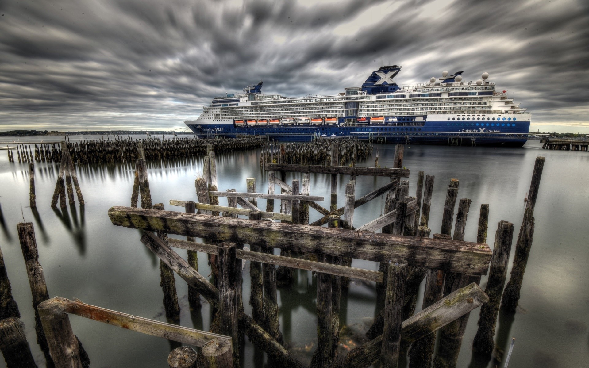 Celebrity Cruises ship docked near old pier pilings HD Wallpaper