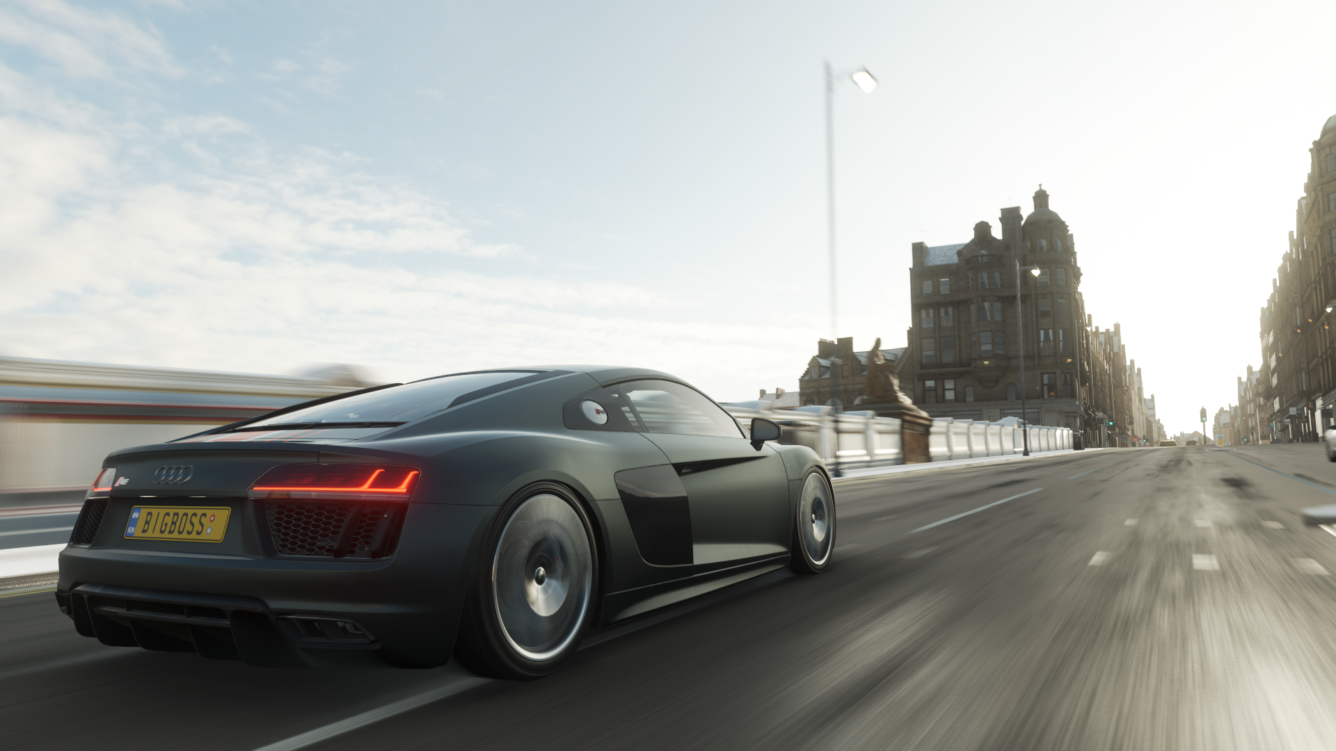 Audi R8 driving through a city in Forza Horizon 4 HD Wallpaper