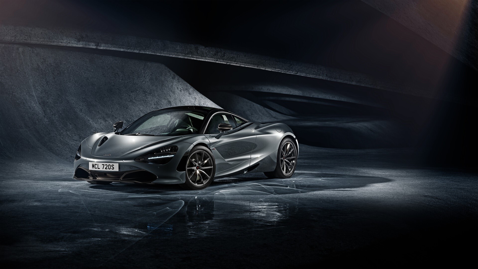 McLaren 720S supercar in a dark, textured environment HD Wallpaper