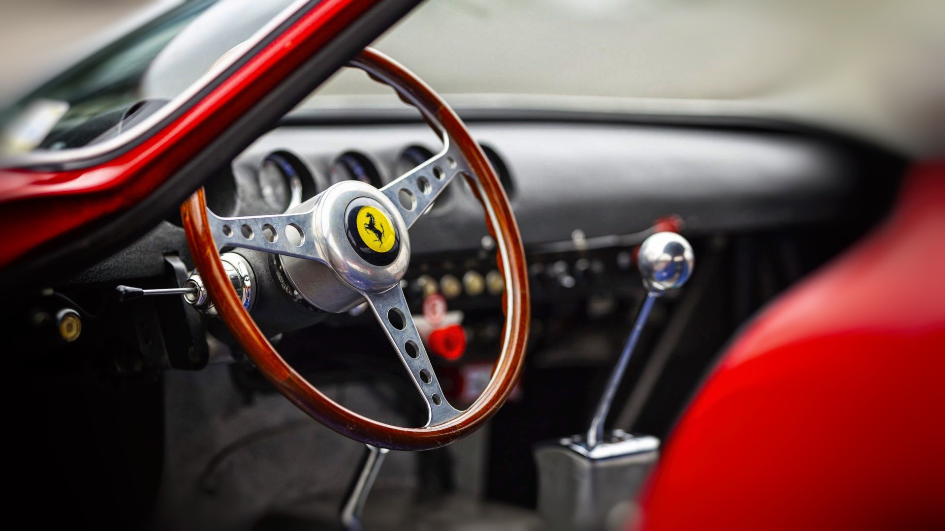Ferrari car interior with steering wheel and gear stick HD Wallpaper