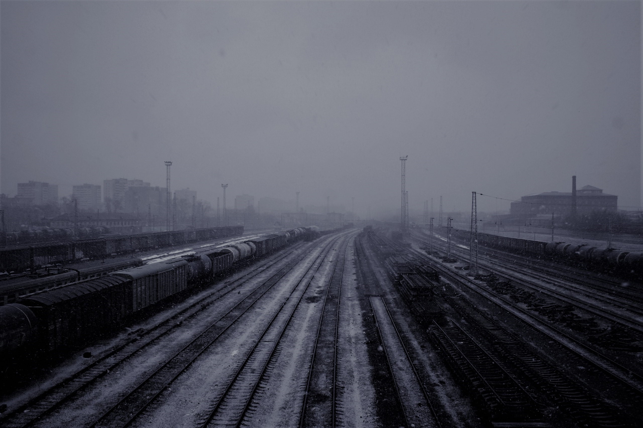 Winter morning at a Russian railway station with trains and mist HD Wallpaper