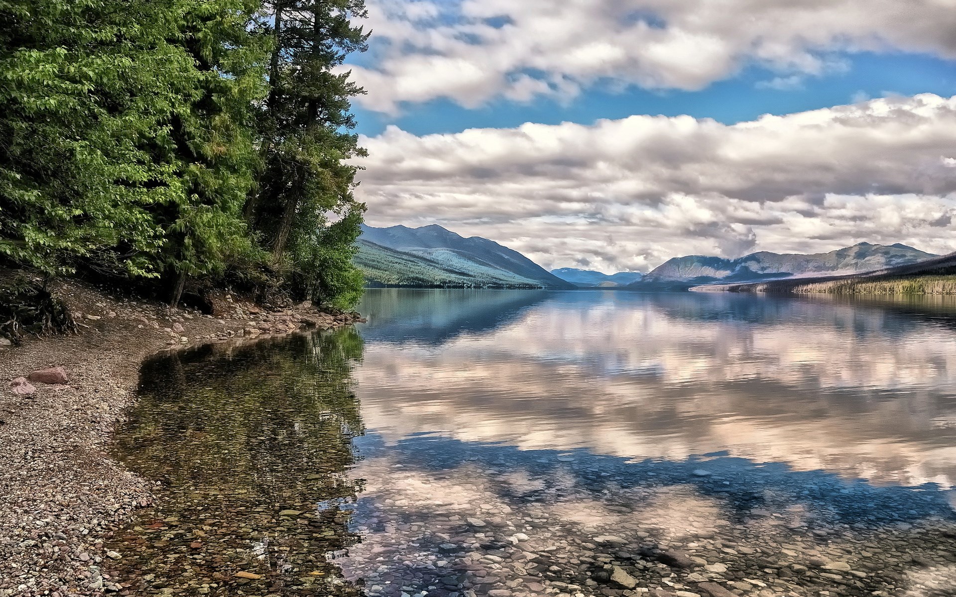Lake McDonald with mountains and clouds HD Wallpaper
