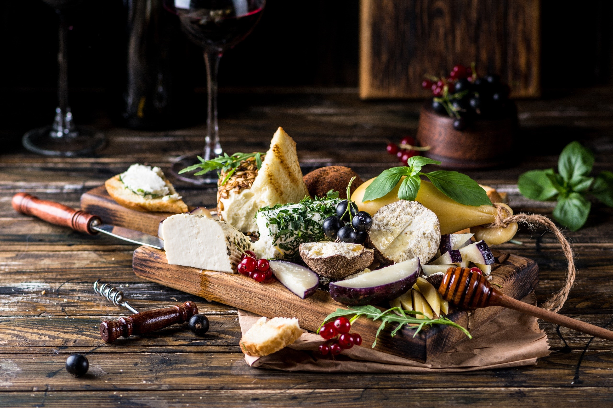 Cheese board with fruits, bread, and wine HD Wallpaper