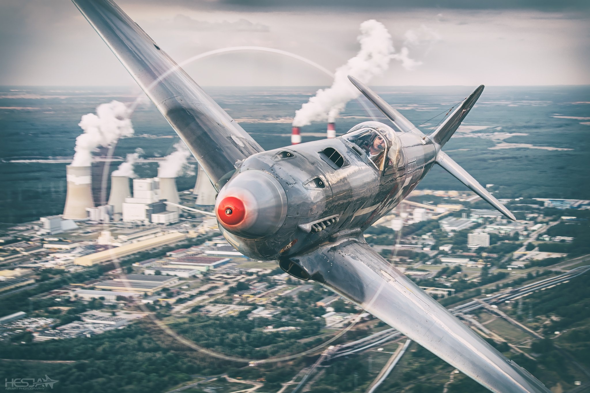 Yakovlev Yak-9 flying over a power plant HD Wallpaper