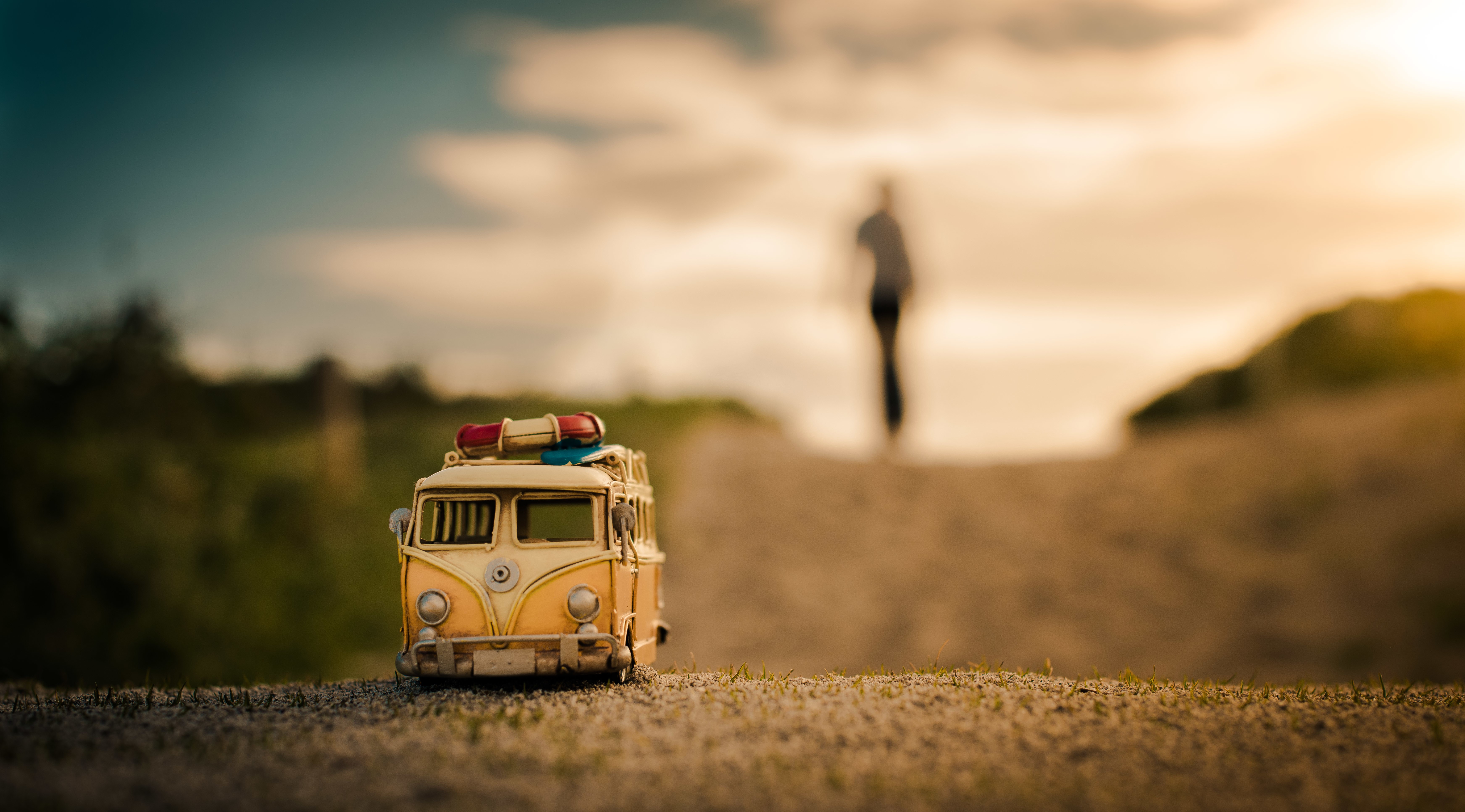 Toy van on a road at sunset HD Wallpaper