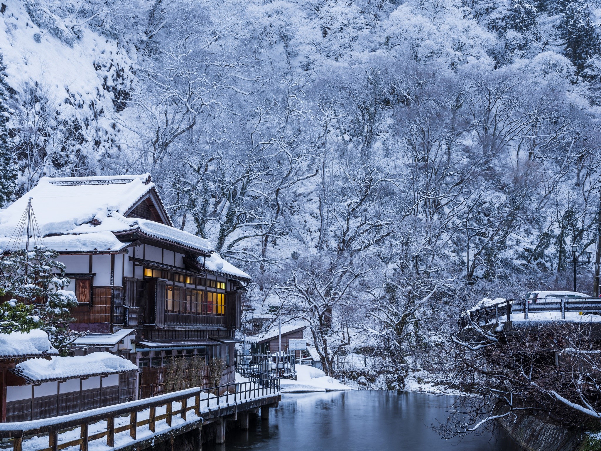Traditional Japanese building in a snowy landscape HD Wallpaper